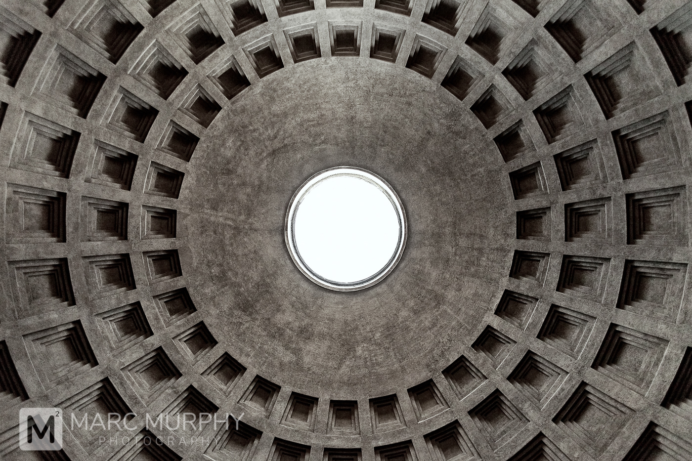 De-Saturated Abstract of the Round Coffered Ceiling of The Pantheon in Rome Italy with the Oculus in the Center