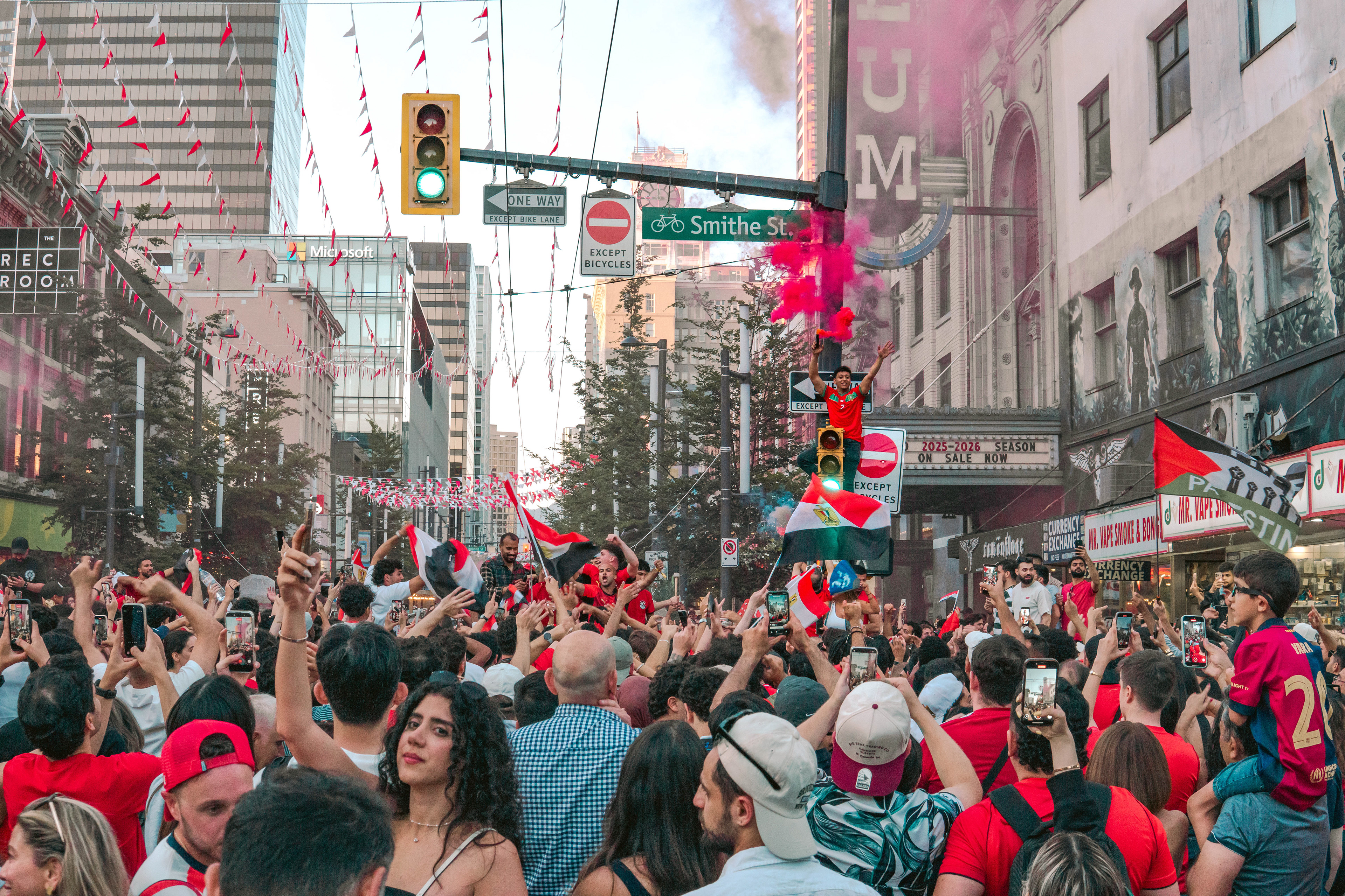 Egypt fans celebrating in Vancouver after the FIFA World Cup win against New Zealand, June 2026.