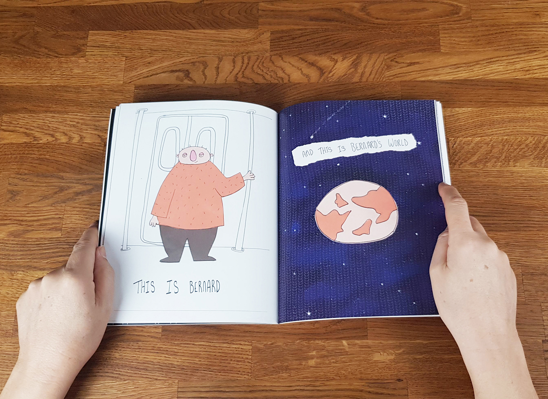 Image of an open book with a character standing by a train door and an image of the world. 