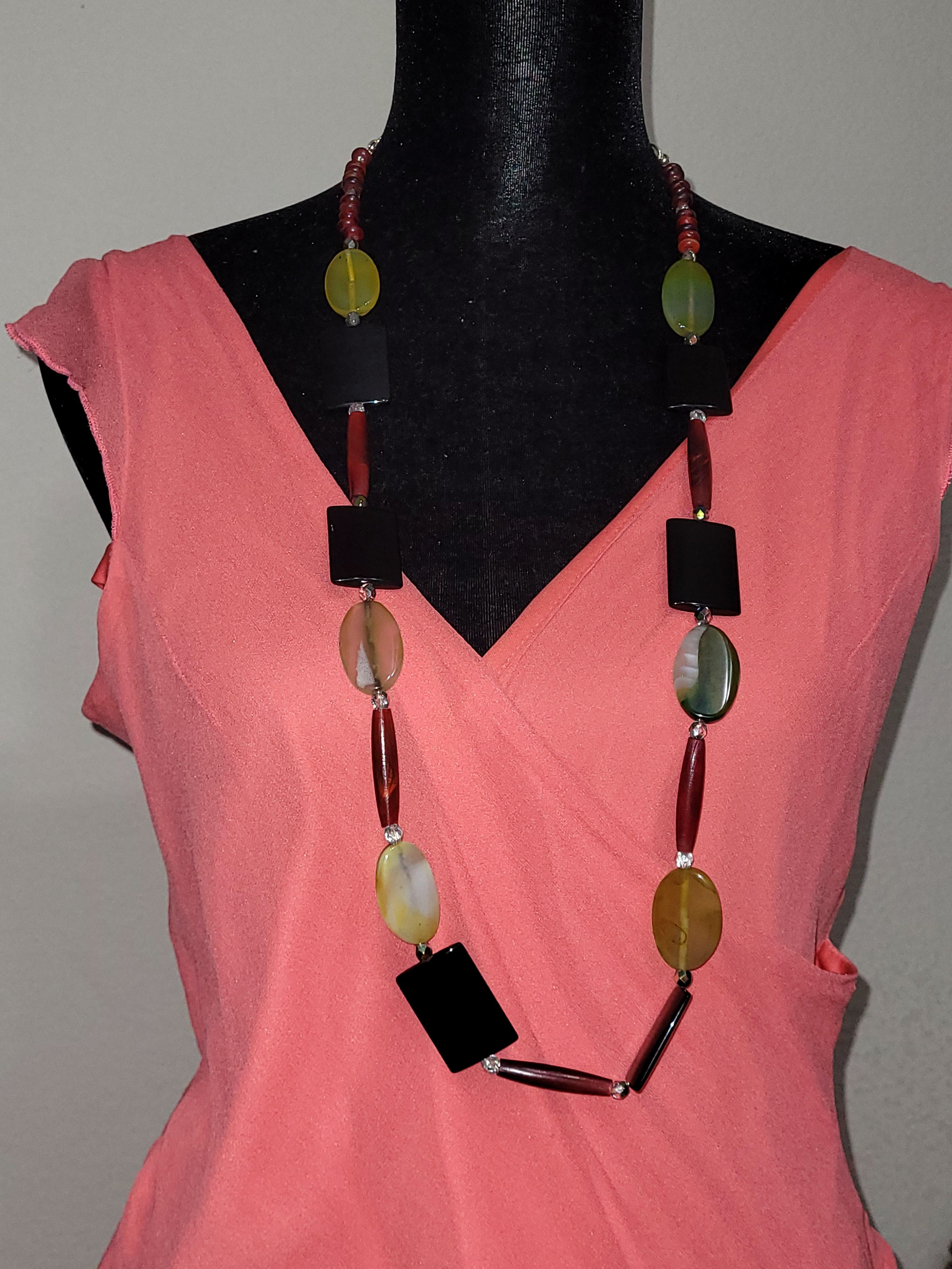 Black and yellow Agate and genuine horn with shiny glass beads. $55