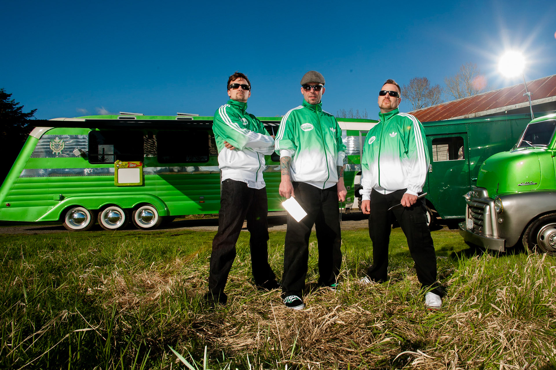 Green Machine Catering were pitching themselves to the Food Network and I was lucky enough to photograph their promo piece.  The original idea was to photograph them with these vehicles in an old car junk yard, but once we got to the yard we realized these huge beutiful trucks were not going to fit in the narrow rusty lanes left for us, so we had to make a new plan.  We moved to this location and worked as best we could we the strong light of the day.  Nikon D3, 18mm, Pocket Wizards and a variety of strobes ranging from a Photofoto 7B to a Speedotron 1205 and some other small flashes. 2011.