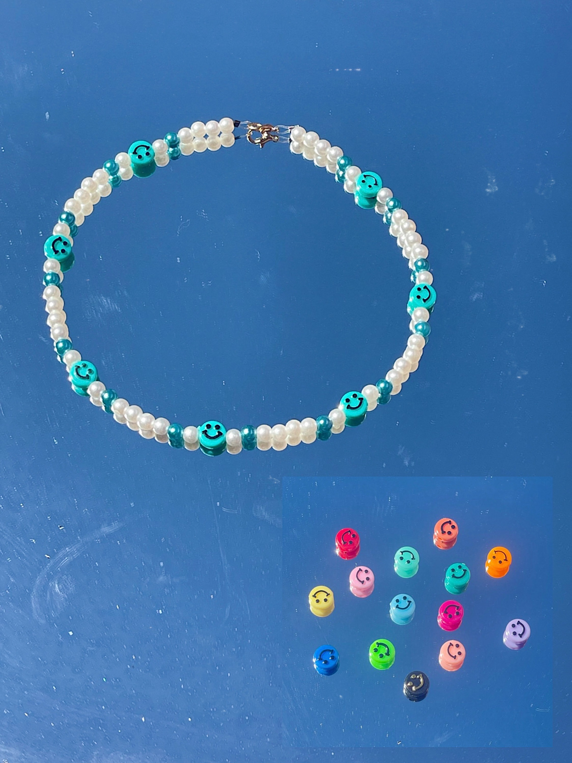 Smilies, perfect for everyday. Available in colors shown above, with pearls to match, of course. $!4. 