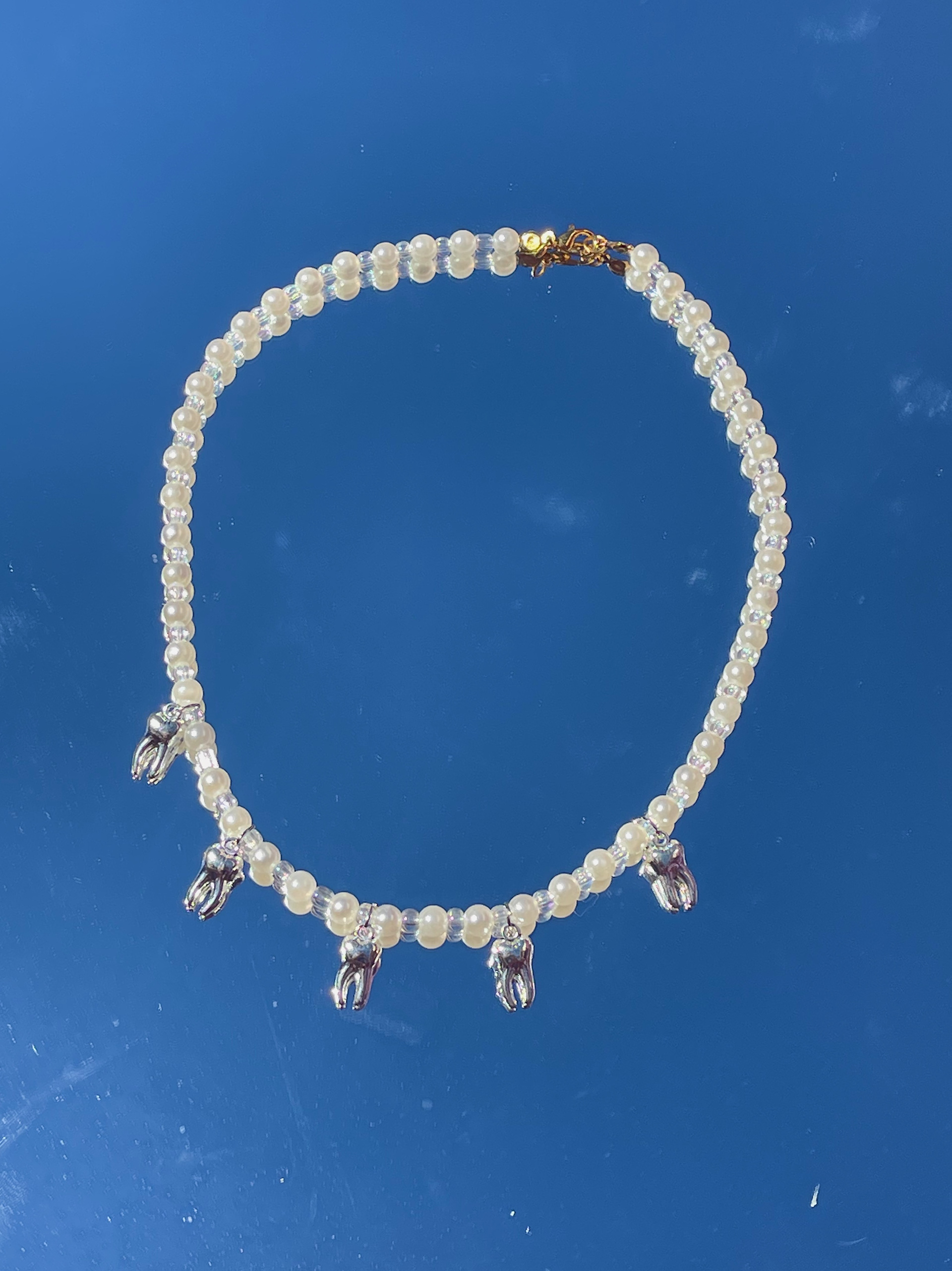 The teeth and pearls, a fan favorite. $14. 
