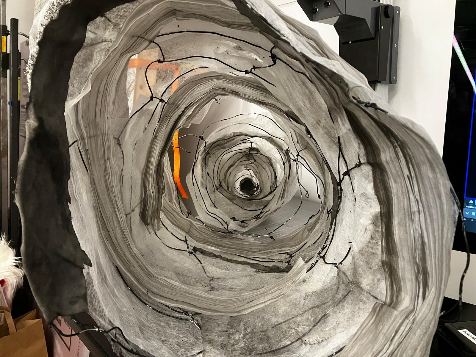 dyed fabric and stained paper layer