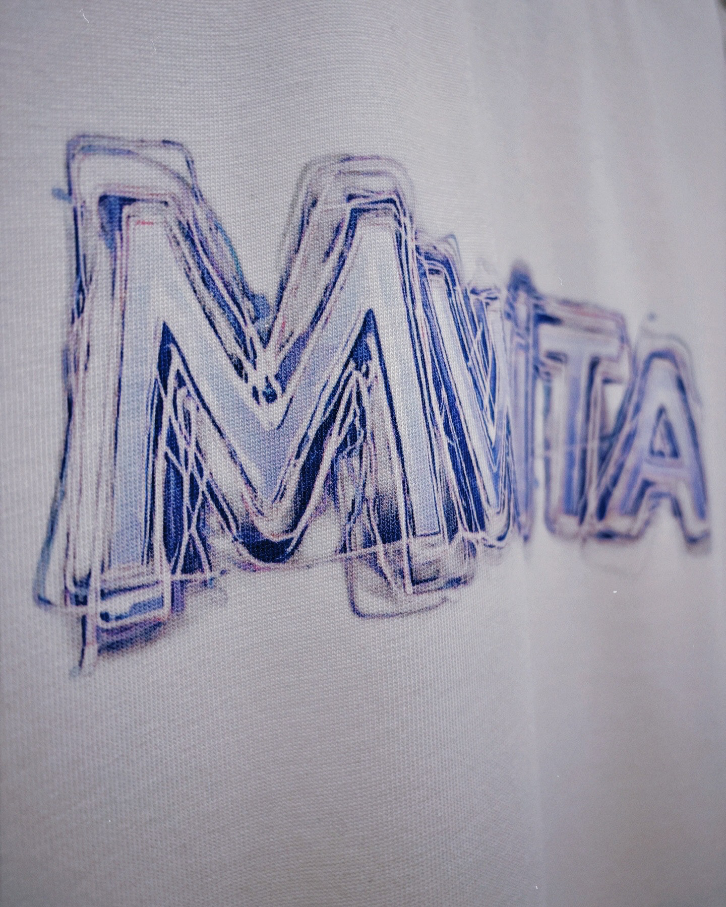 Close up of SM Voltage T-shirt
