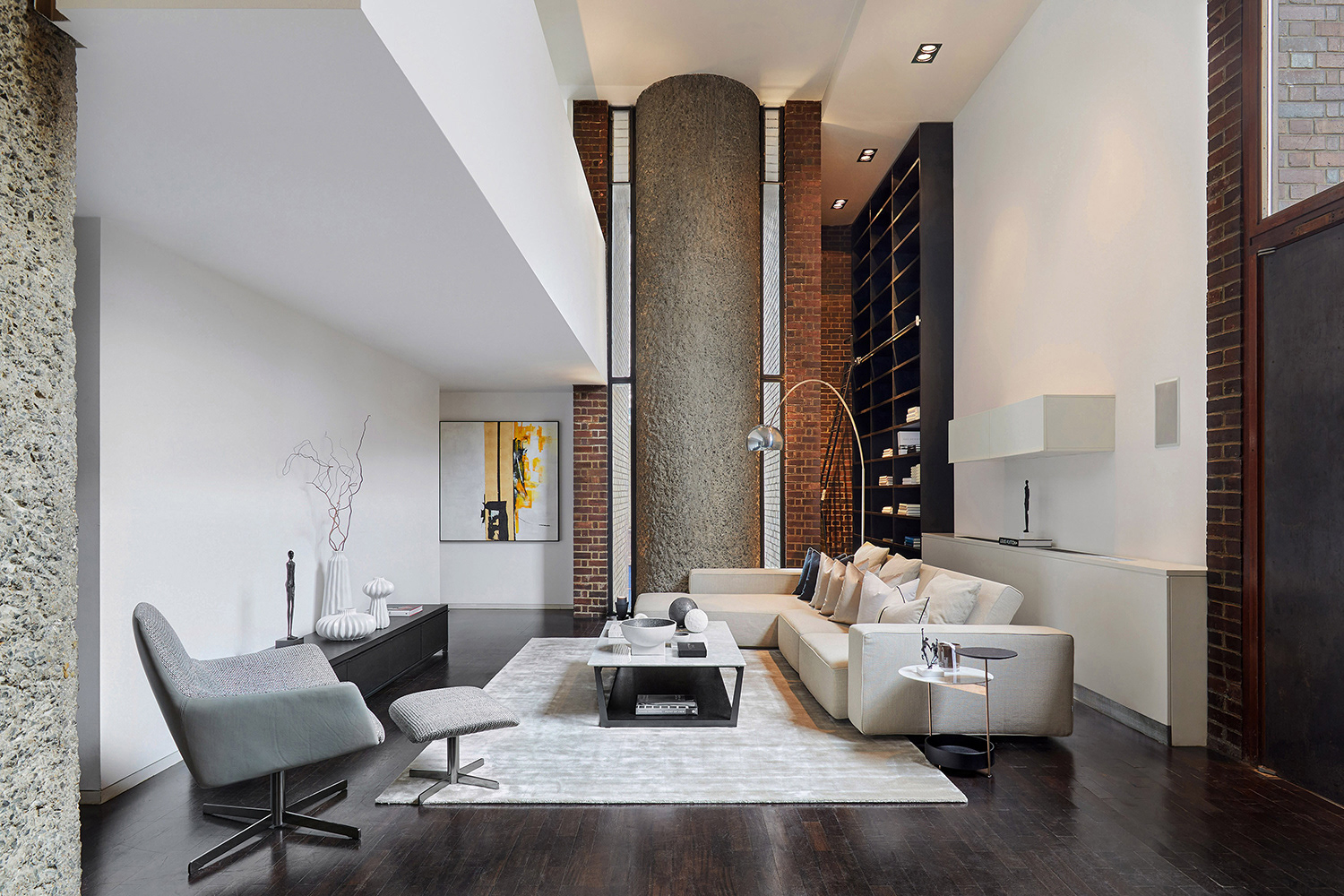 Barbican Estate apartment interior combining original concrete details with contemporary furniture.
