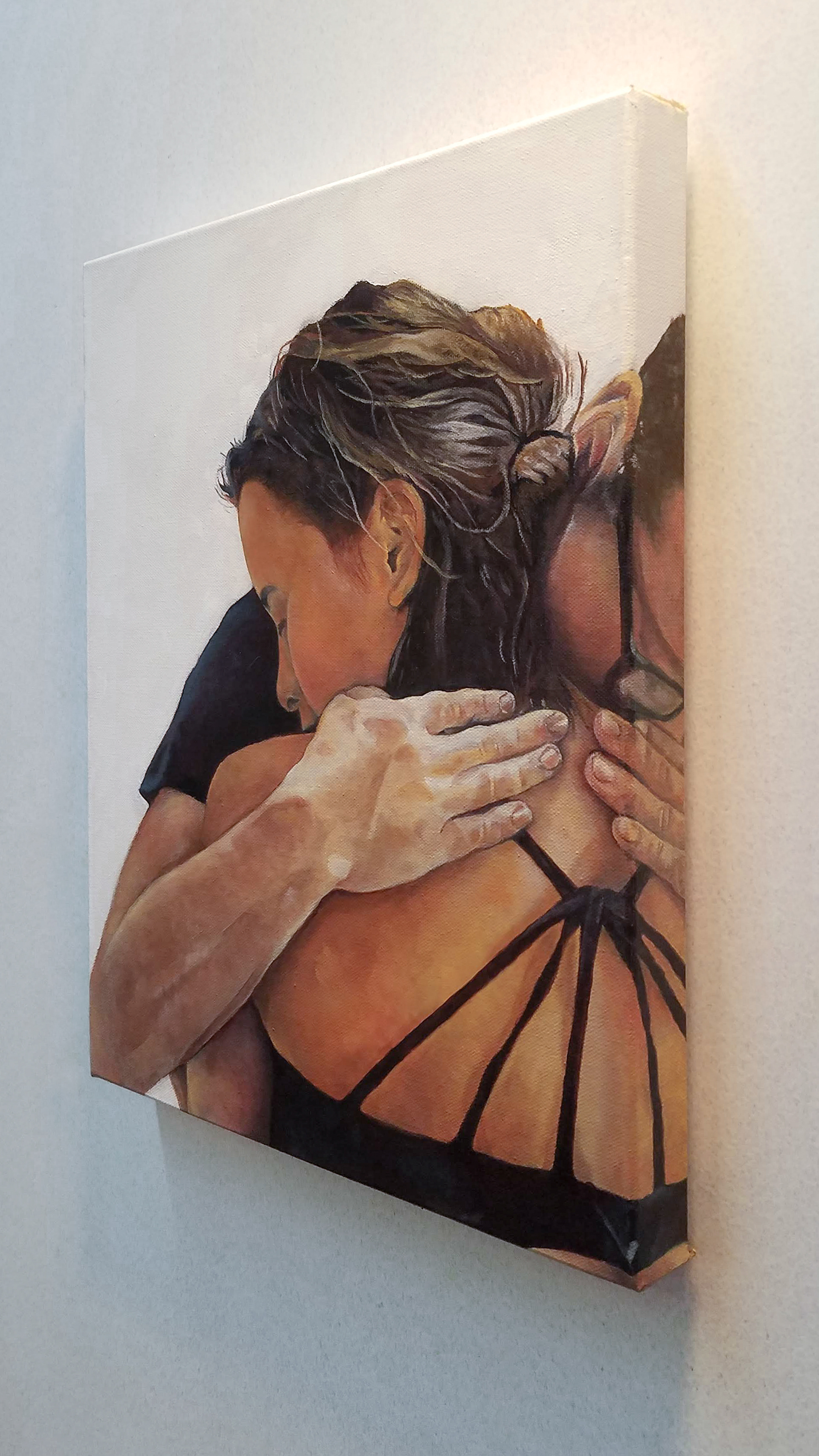 Angled view showing painting wrapping to the sides of the canvas.