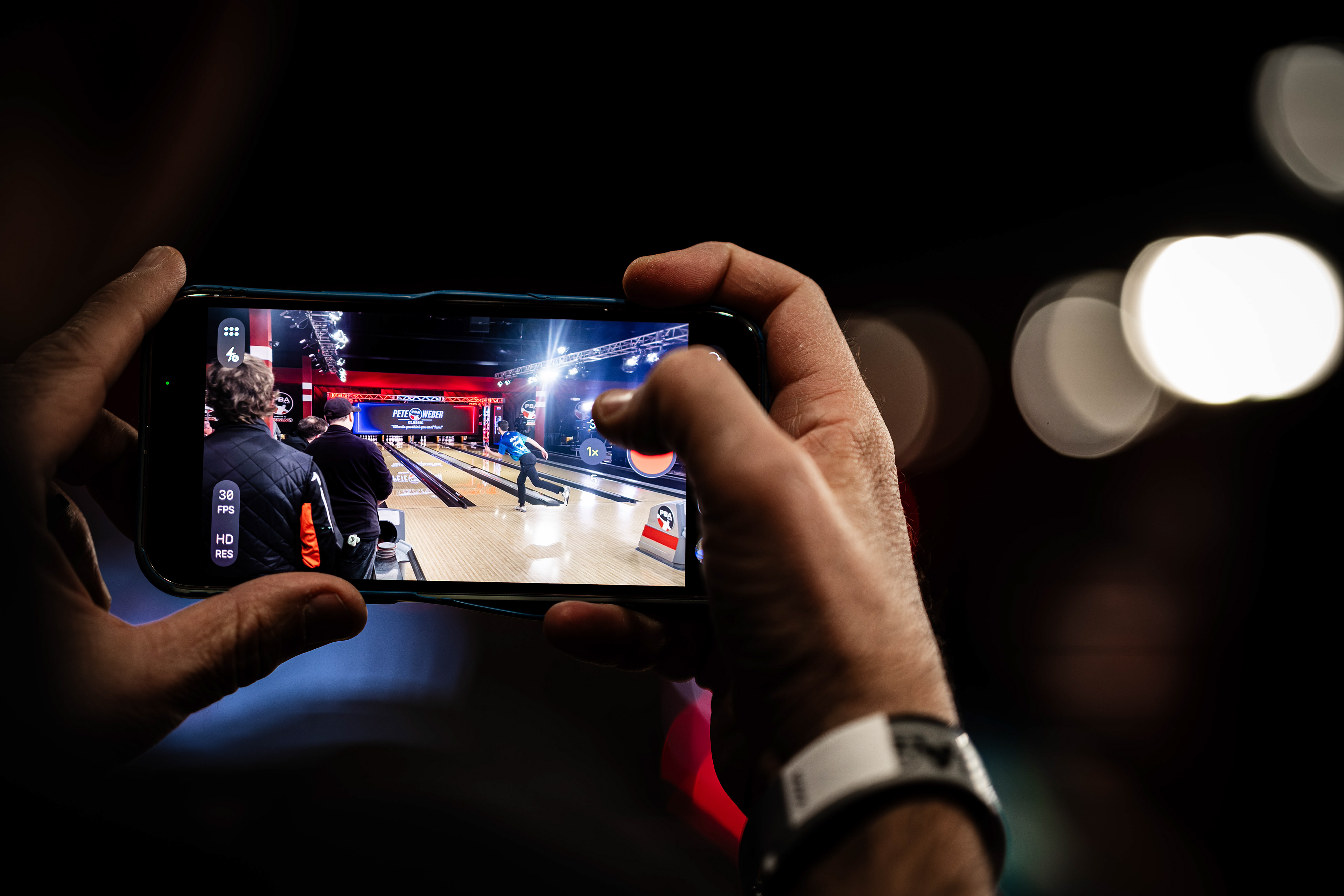 A fan takes a video of PBA bowler Hayden Stippich prior to the start of the PBA Pete Weber Missouri Classic, at Bowlero St. Peters, located at St. Peters, Missouri, on March 1, 2026.