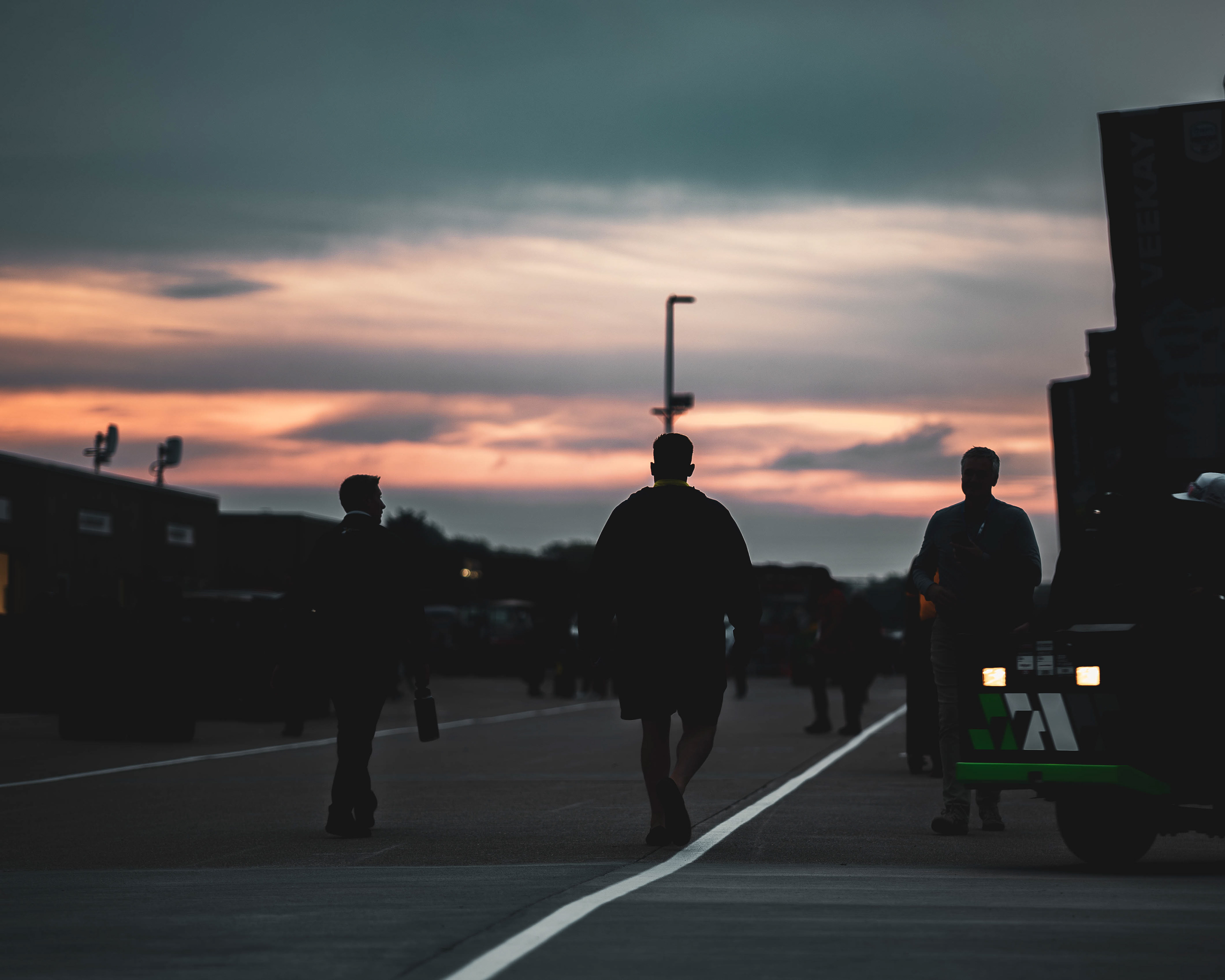 Patrons walk the garage area of Indianapolis Motor Speedway the morning of the 110th Indianapolis 500, located in Speedway, Indiana, on May 24, 2026.