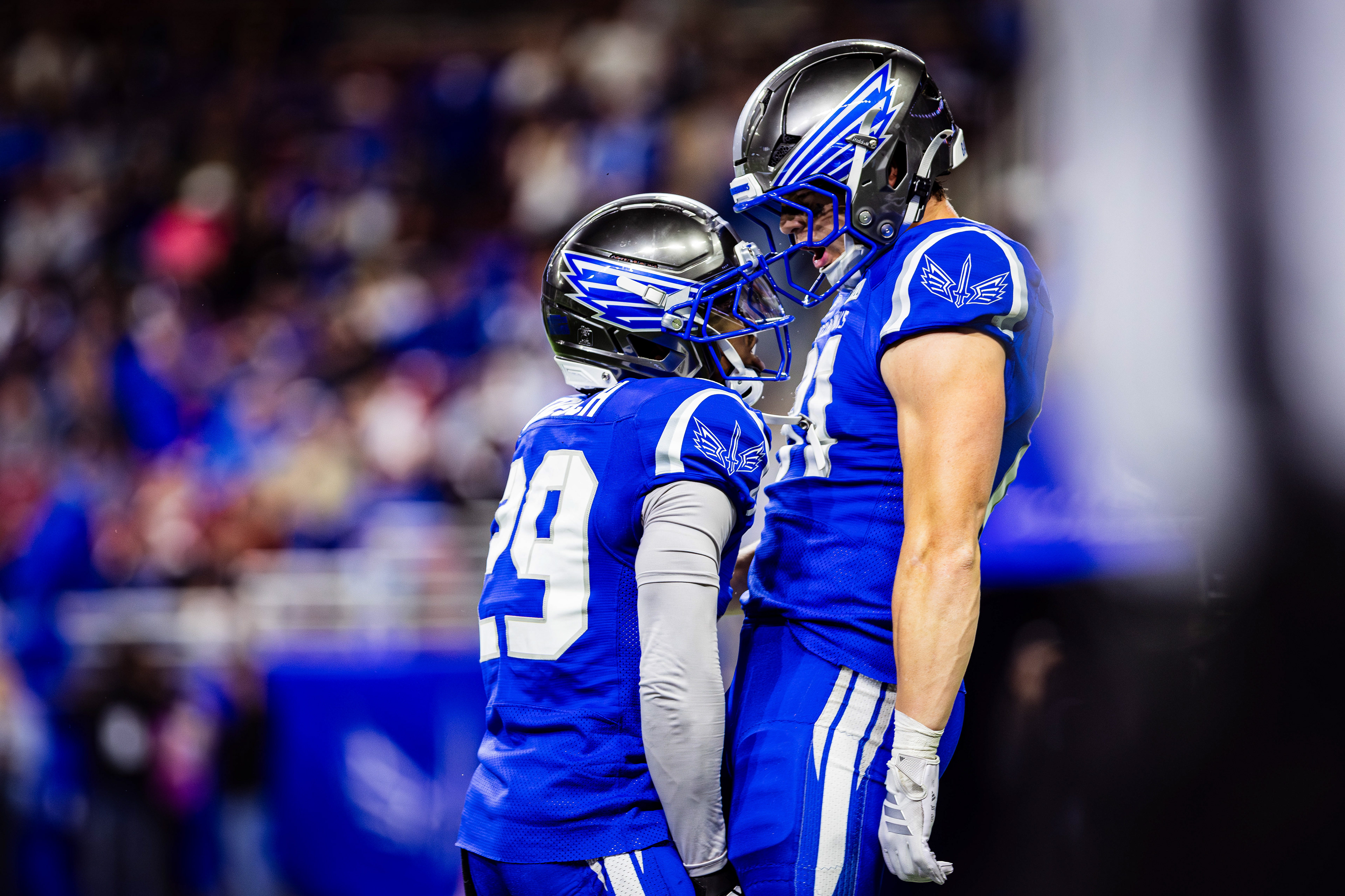 St. Louis Battlehawks cornerback Sean Fresch (left) and tight end Tyler Neville (right) celebrate during the game against the DC Defenders at The Dome at America's Center, located in St. Louis, Missouri, on March 28, 2026.