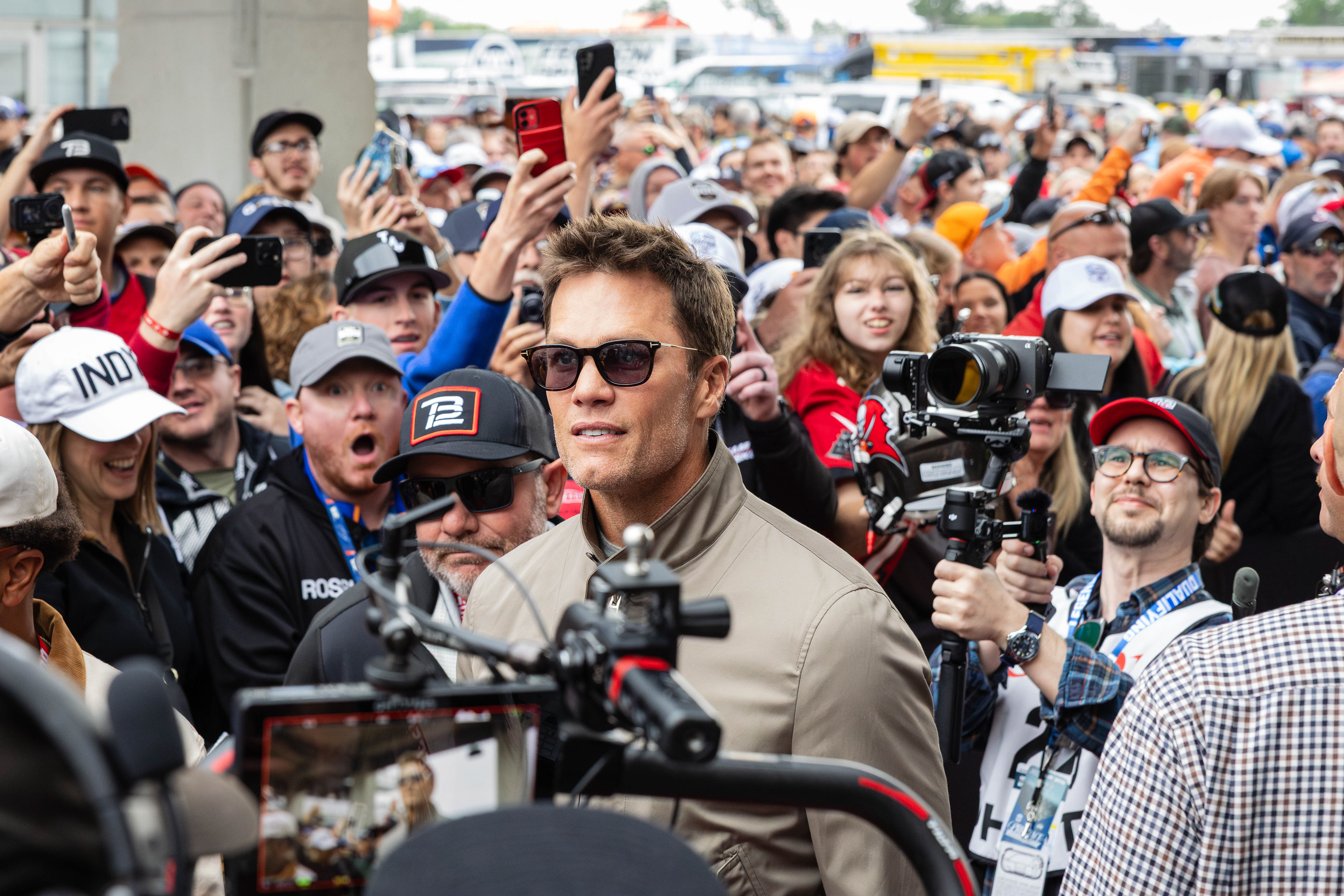Tom Brady walks through the red carpet prior to the start of the 2025 Indianapolis 500, at the Indianapolis Motor Speedway, located in Speedway, Indiana, on May 25, 2025. 