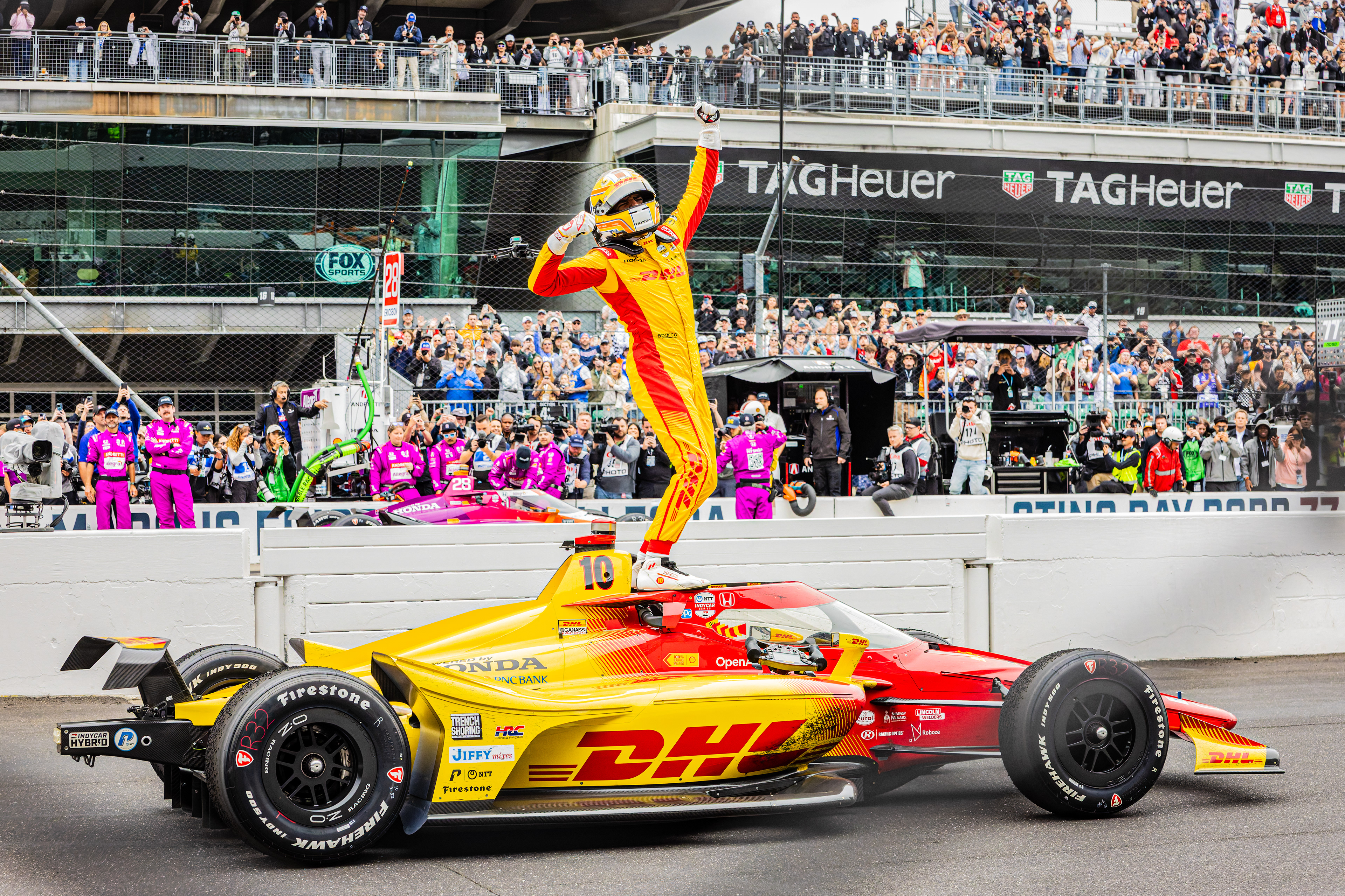 Alex Palou, driver of the No. 10 Honda for Chip Ganassi Racing in the NTT INDYCAR Series, celebrates on the frontstretch after winning the 2025 Indianapolis 500, at the Indianapolis Motor Speedway, located in Speedway, Indiana, on May 25, 2025.