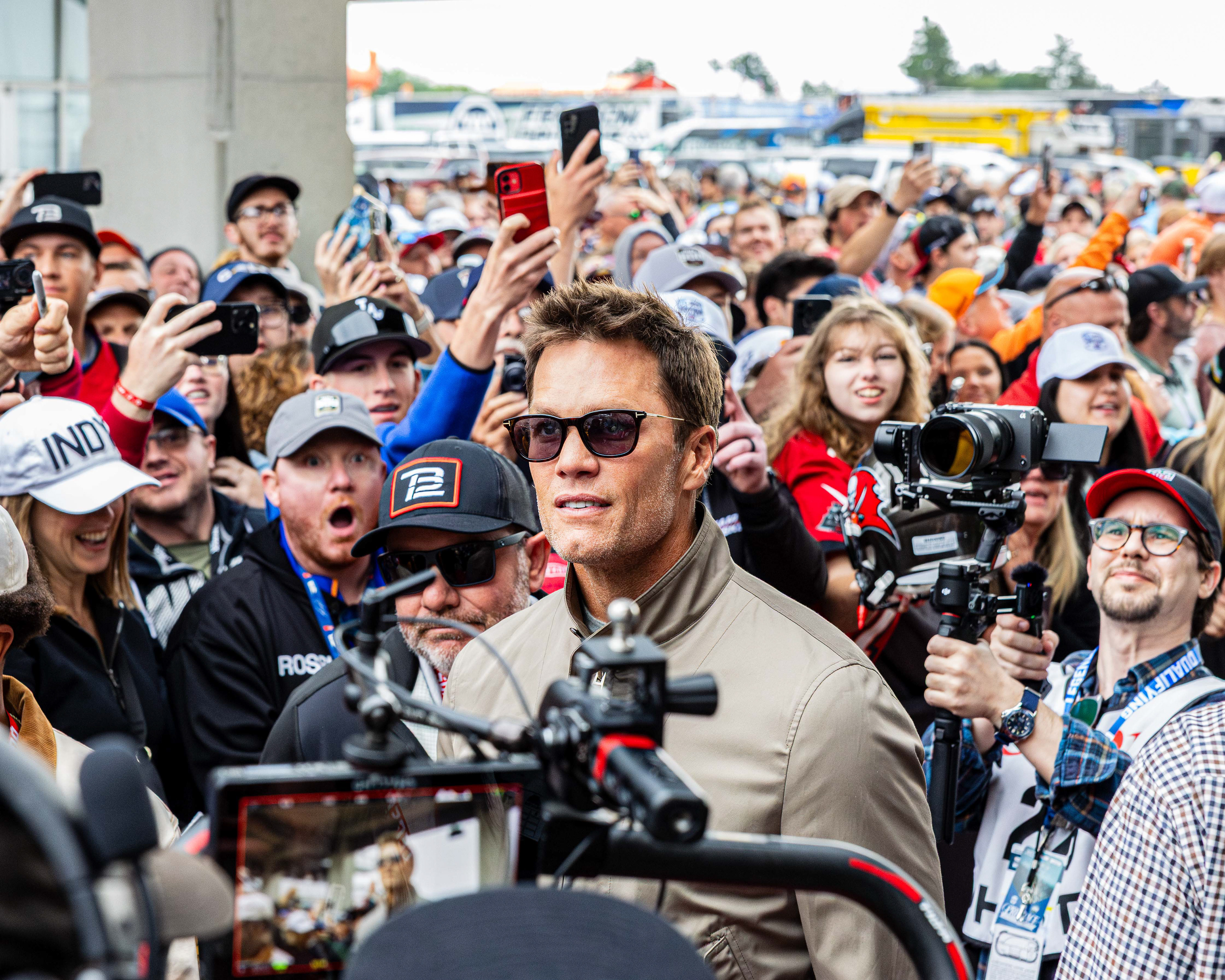 Tom Brady walks through the red carpet prior to the start of the 2025 Indianapolis 500, at the Indianapolis Motor Speedway, located in Speedway, Indiana, on May 25, 2025. 