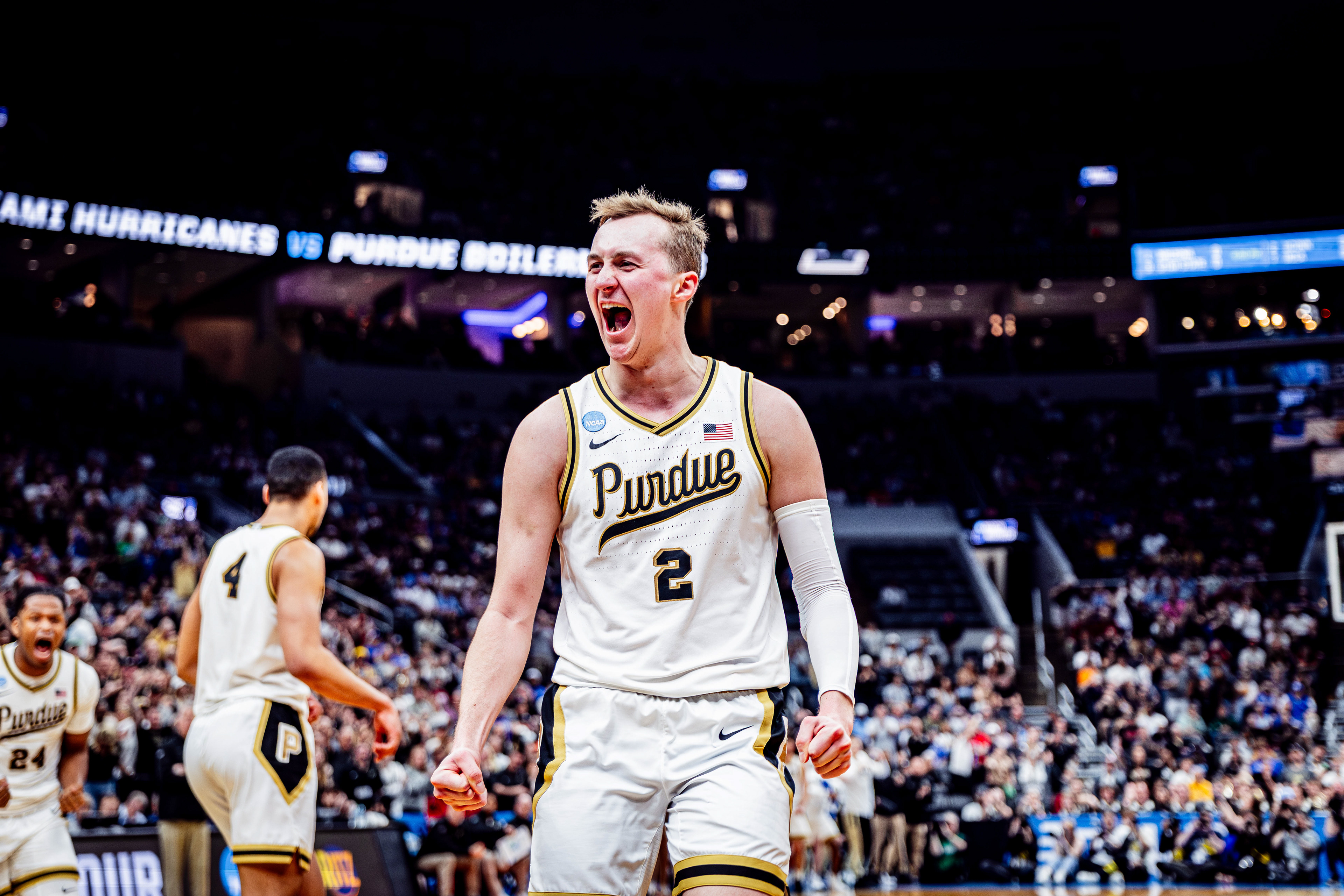Purdue basketball player Fletcher Loyer celebrates in the March Madness Round of 32 game against Miami, at the Enterprise Center, located in St. Louis, Missouri, on March 22, 2026.