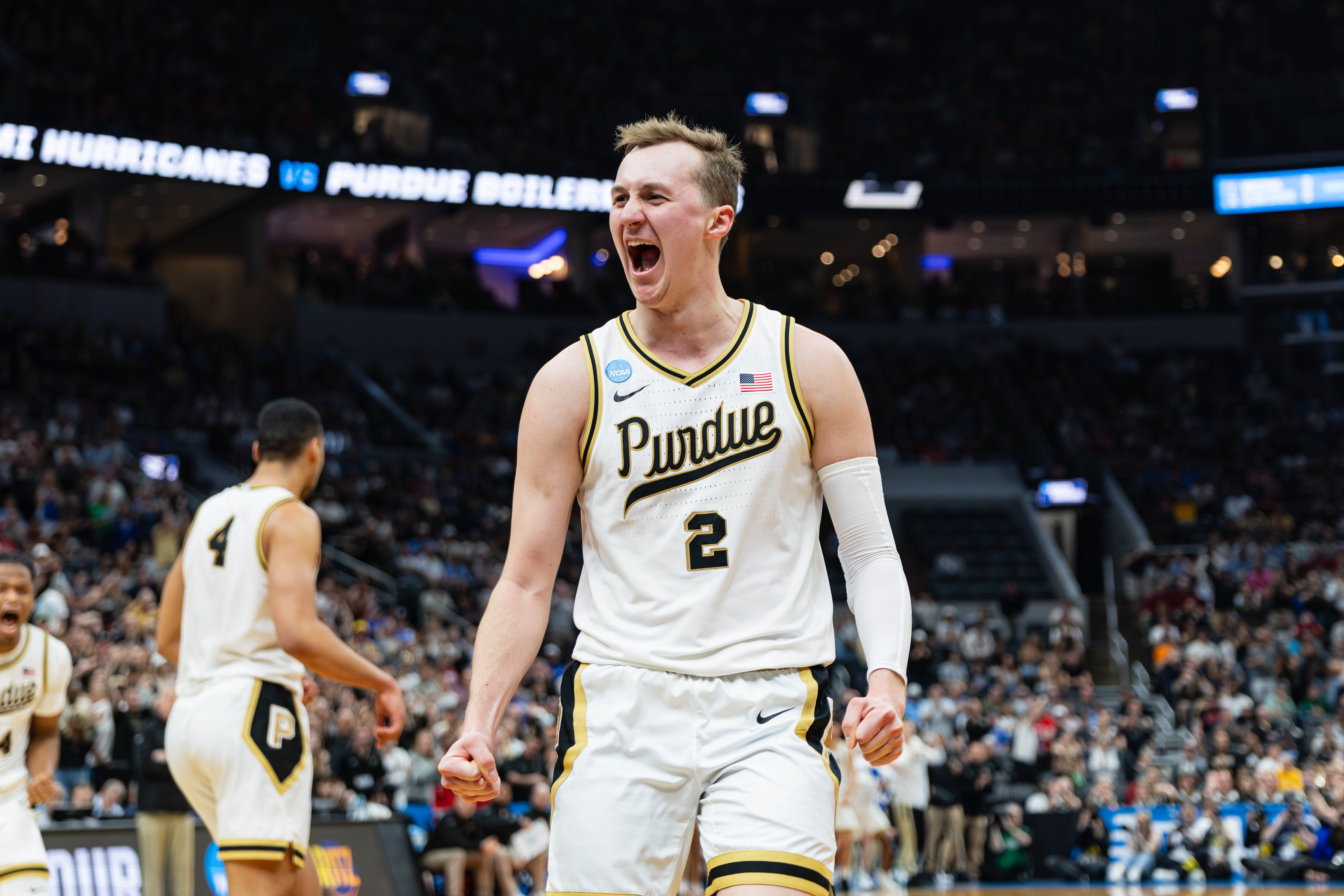 Purdue basketball player Fletcher Loyer celebrates in the March Madness Round of 32 game against Miami, at the Enterprise Center, located in St. Louis, Missouri, on March 22, 2026.