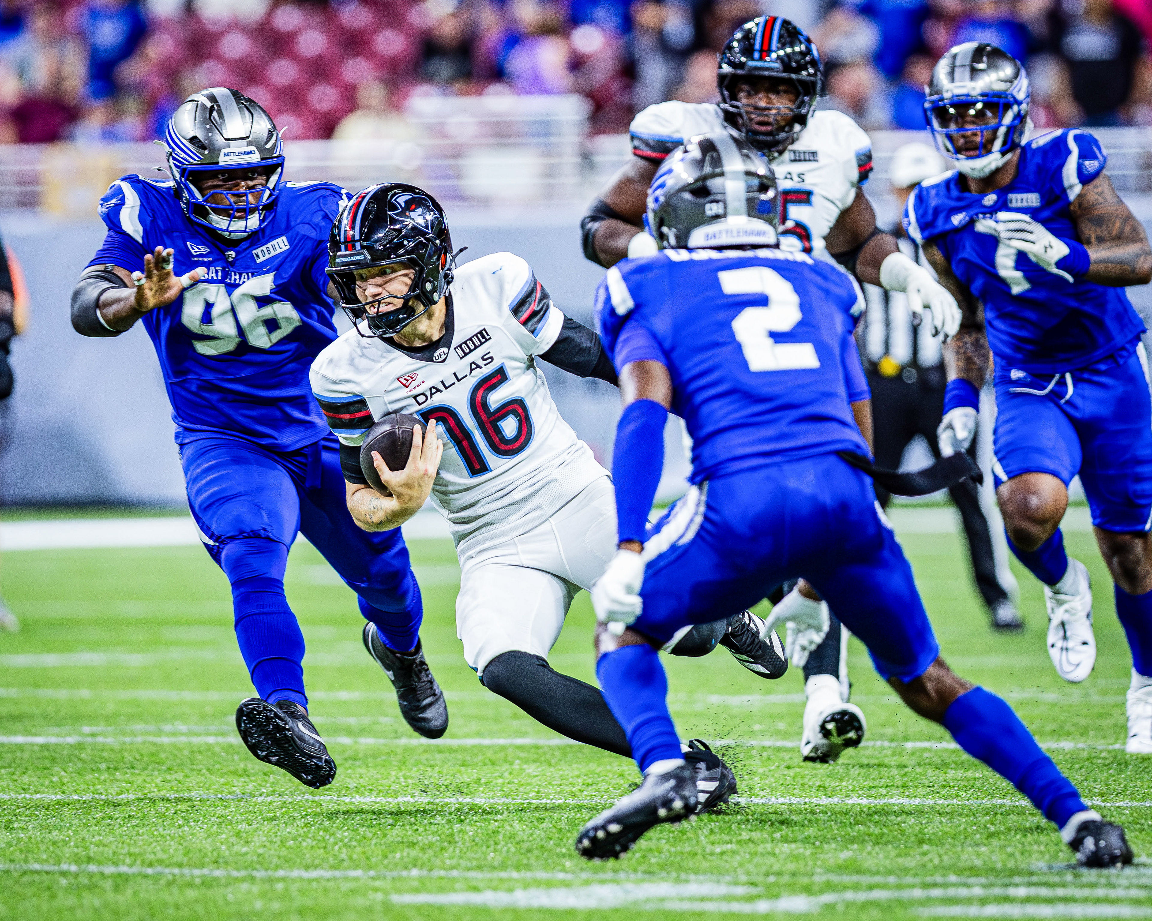 Renegades quarterback Austin Reed rushes the football up the field against the St. Louis Battlehawks, at the Dome at America's Center, located in St. Louis, Missouri, on May 29, 2026.