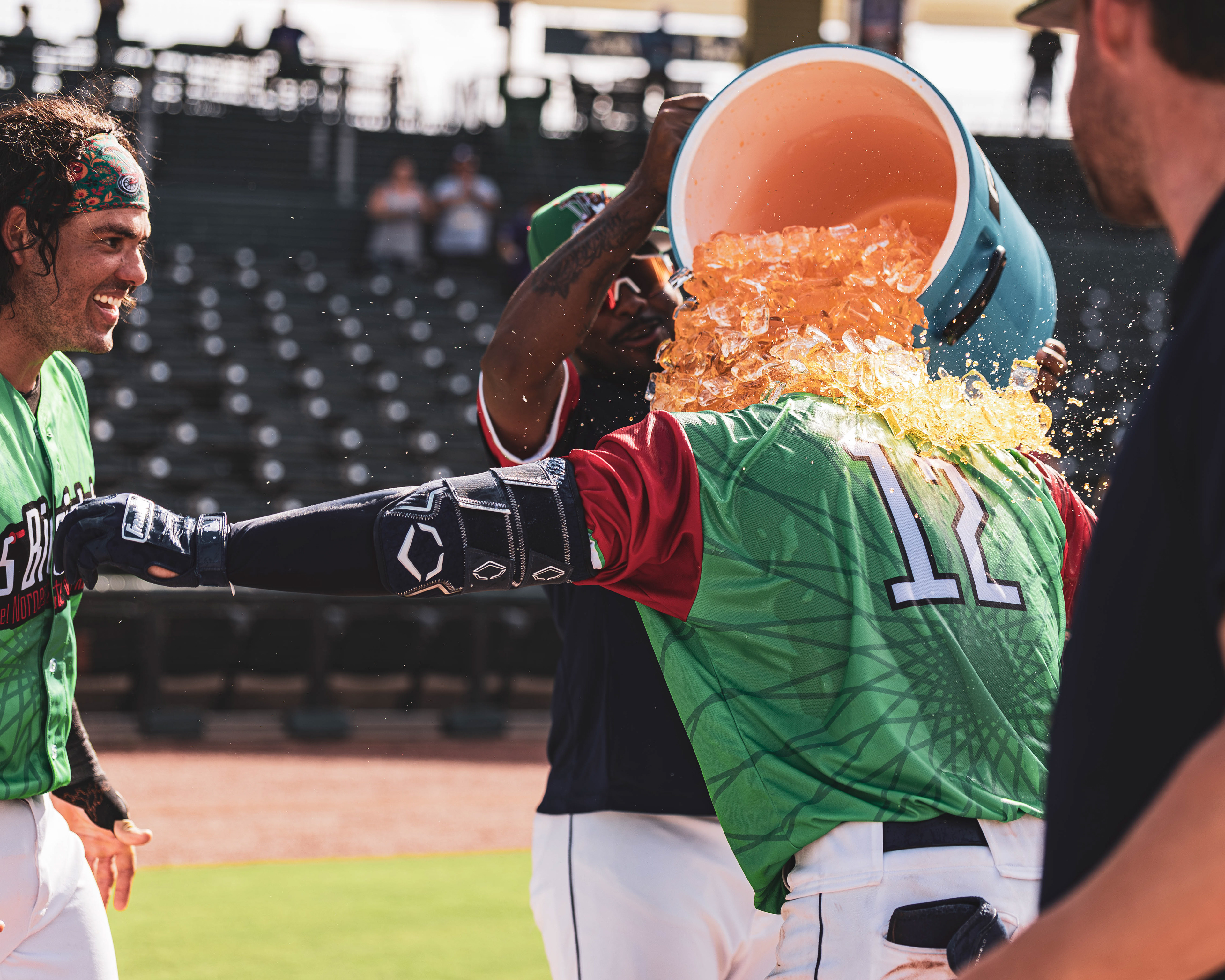 Northwest Arkansas Naturals player Omar Hernandez is doused witb Powerade by teammates after hitting a walkoff home run in the game against the Midland Rockhounds, at Arvest Ballpark in Springdale, Arkansas, on July 19, 2026.