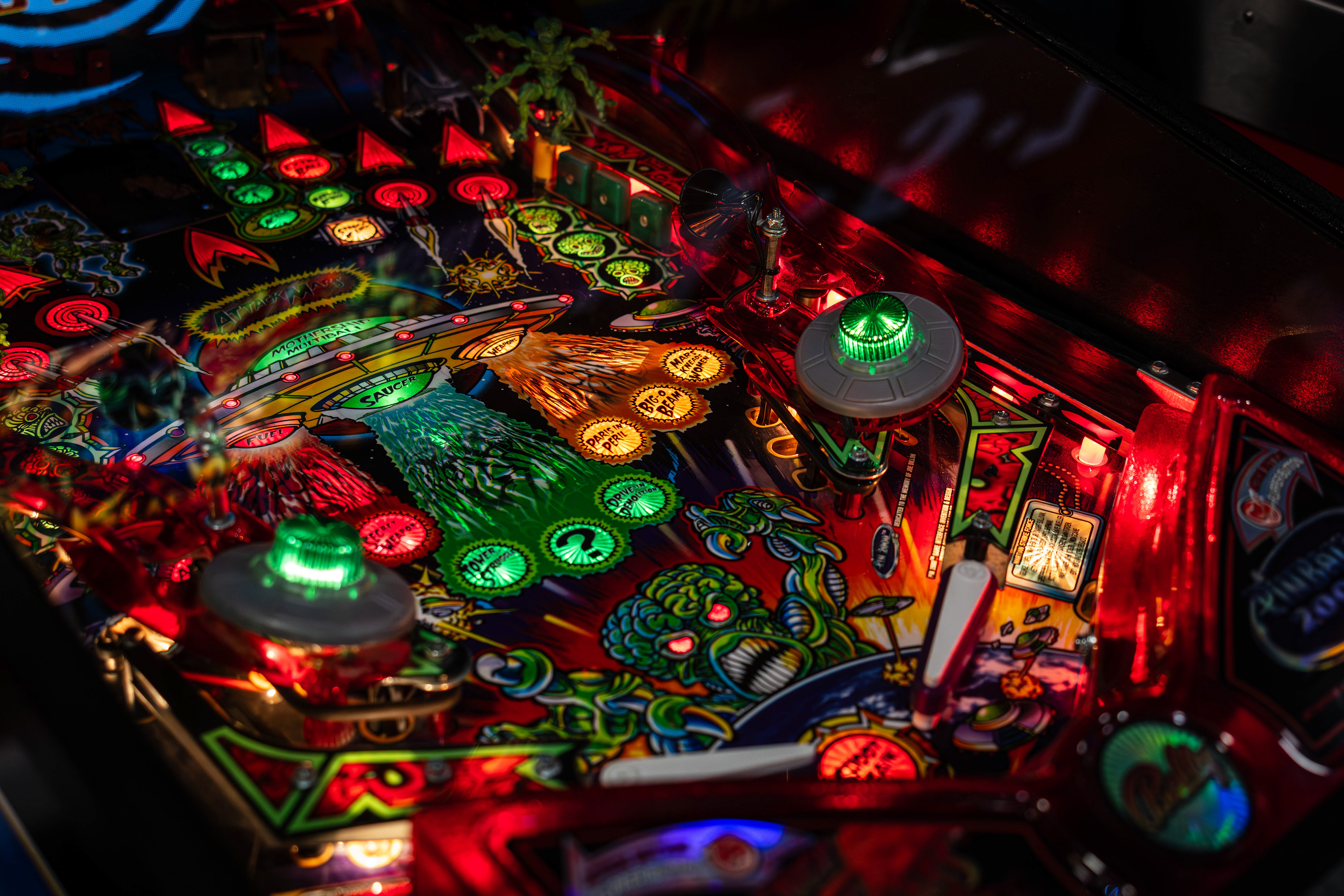 Pinball machine Revenge From Mars is turned on prior to arcade NWA Pinball being opened, in Rogers, Arkansas, on July 5, 2025.