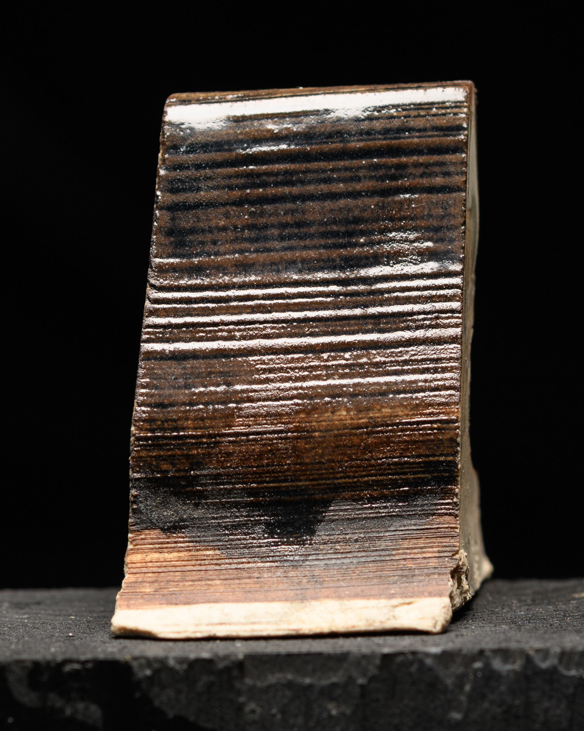 Iron Oxide slip - Black, copper (wiped), clear