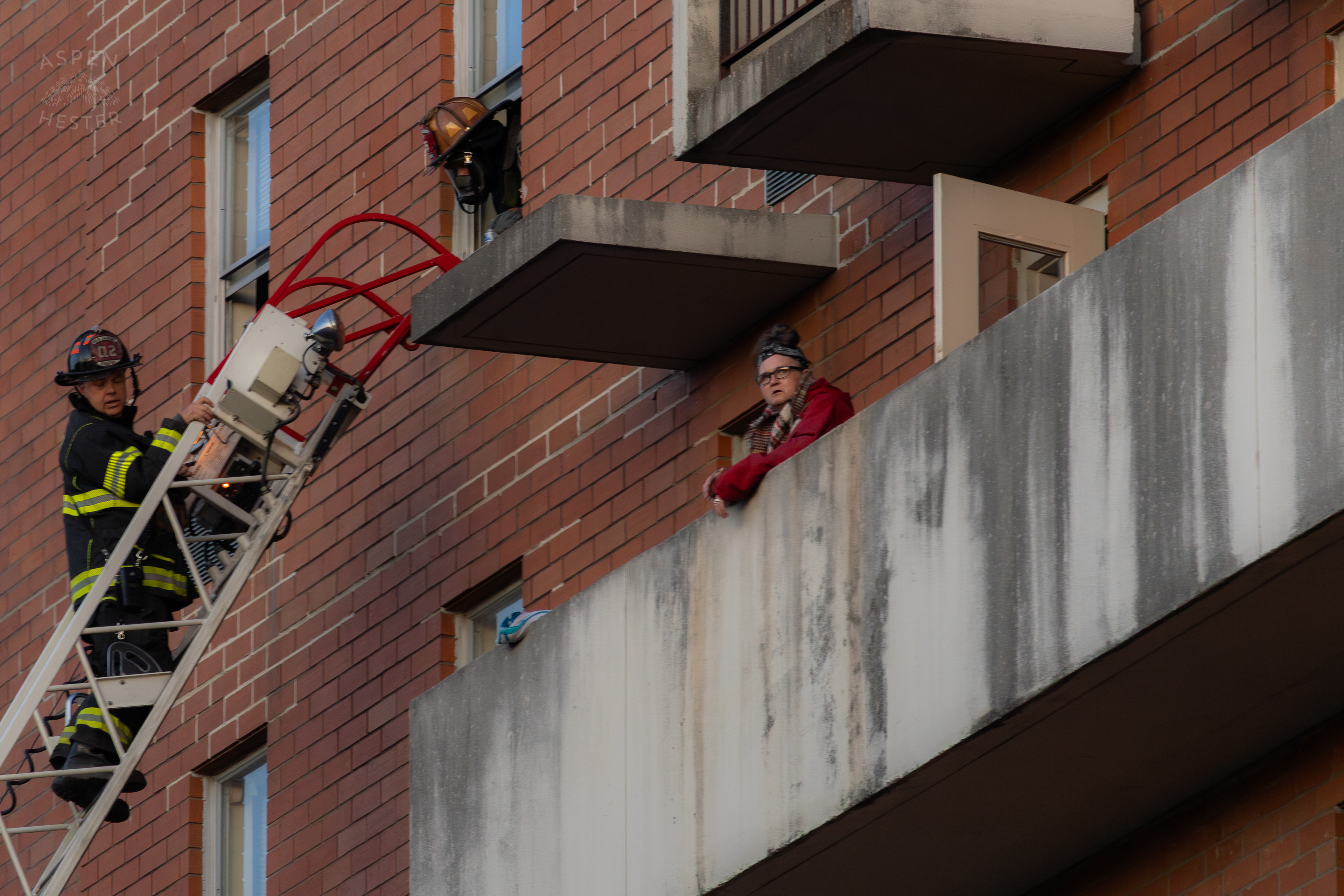 Firefighters Save A Trapped Resident on A High Floor From The Parkview Tower Fire in New Albany Indiana. March 22nd, 2025/Aspen Hester