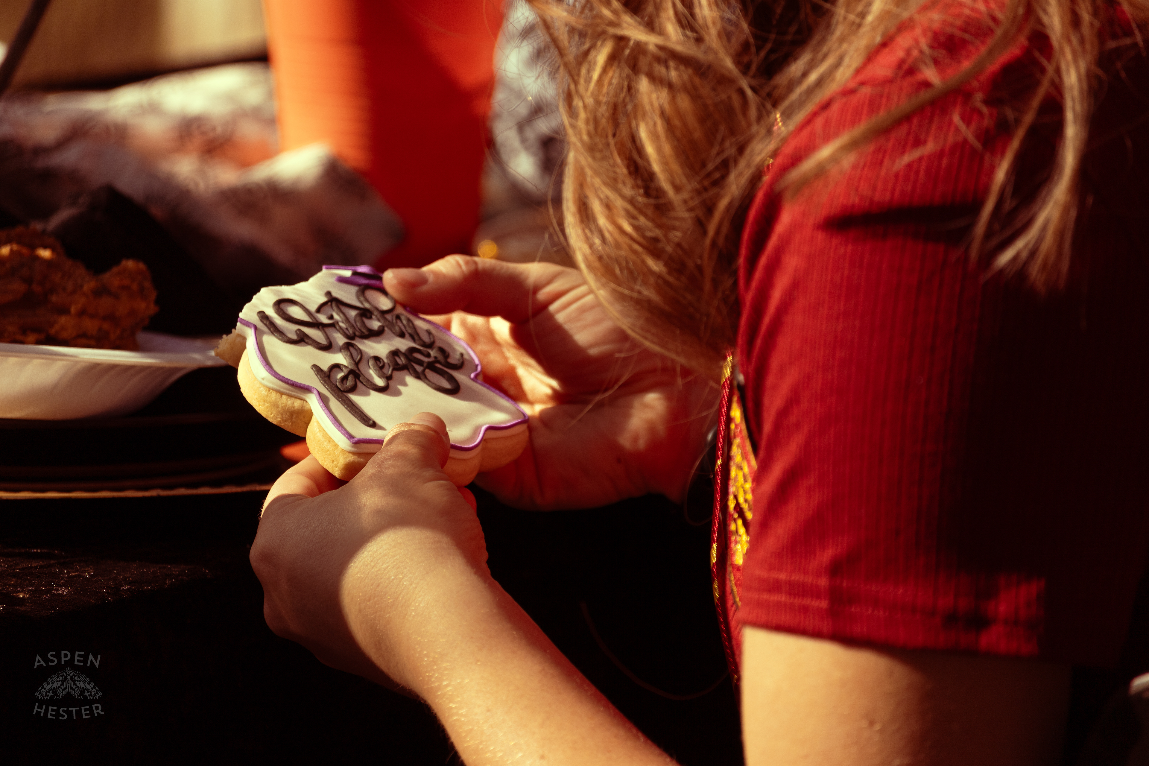 “Witch Please” Cookie Being Eaten at Stacey Edrington’s Yearly Witches Brunch in Mt. Washington. October 26th, 2024/Aspen Hester