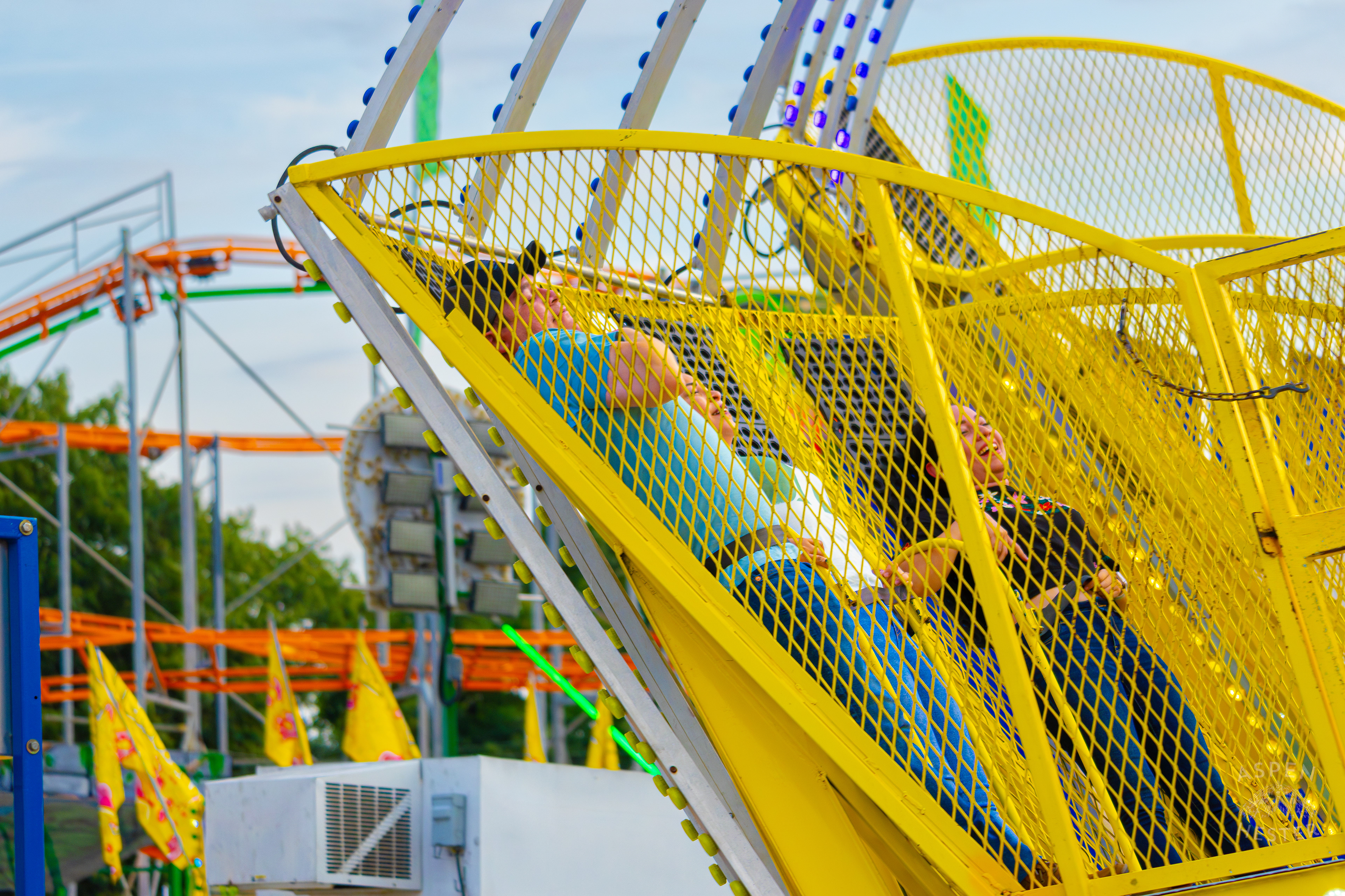 People Spinning Around a Ride at The 120th Kentucky State Fair. July 15th, 2024/Aspen Hester