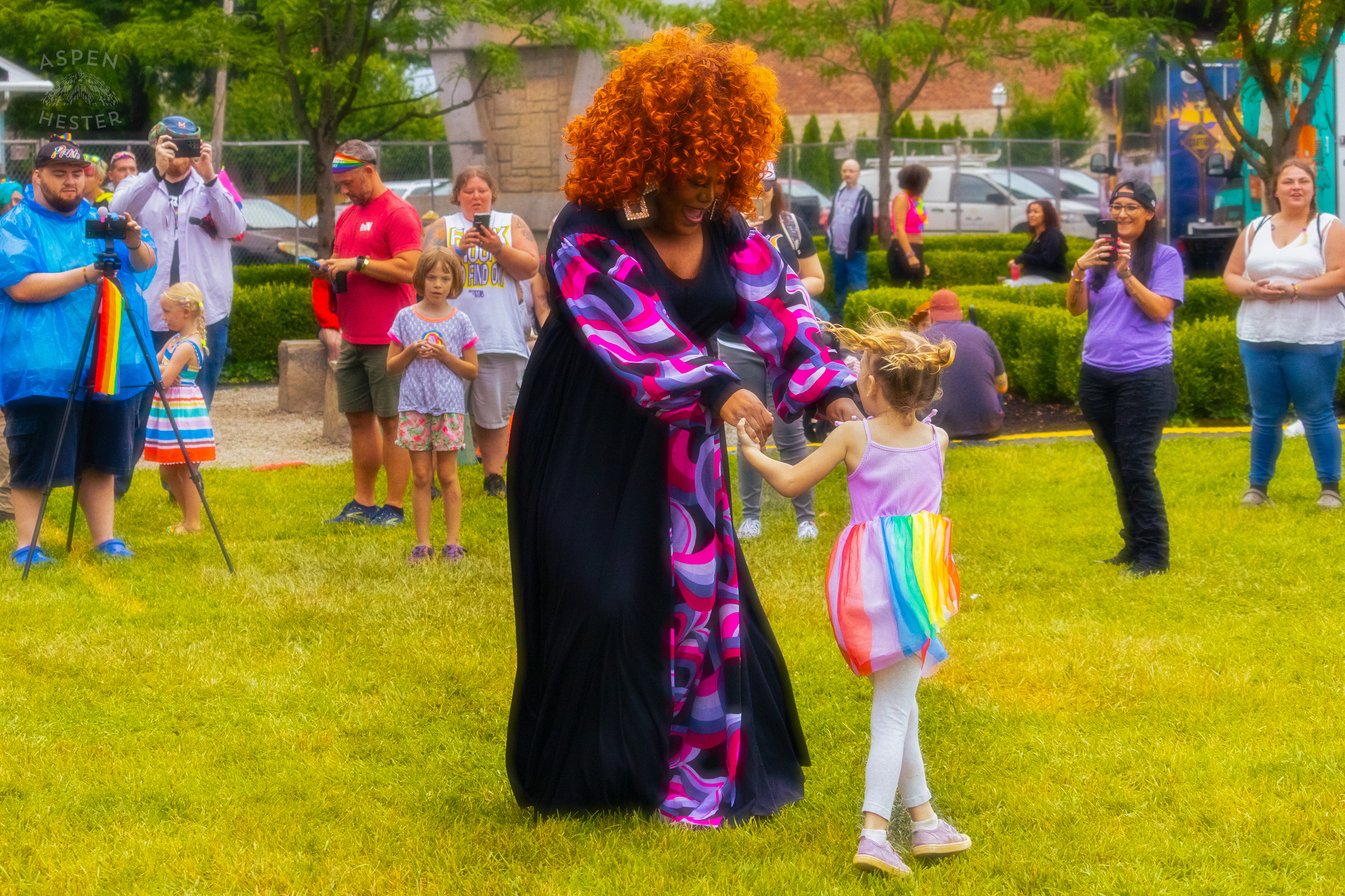 Drag Queen Dancing with A Kid from The Crowd While Performing 'Greatest Love of All' by Whitney Houston During Pride Bar's Family Friendly Drag Show at Southern Indiana Pride. June 1st, 2024/Aspen Hester