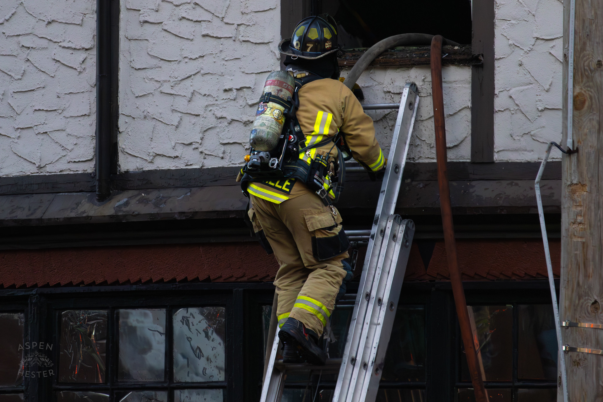 Louisville Firefighter Entering Burning Building on The Corner of 2nd and Oak Street. June 7th, 2024/Aspen Hester
