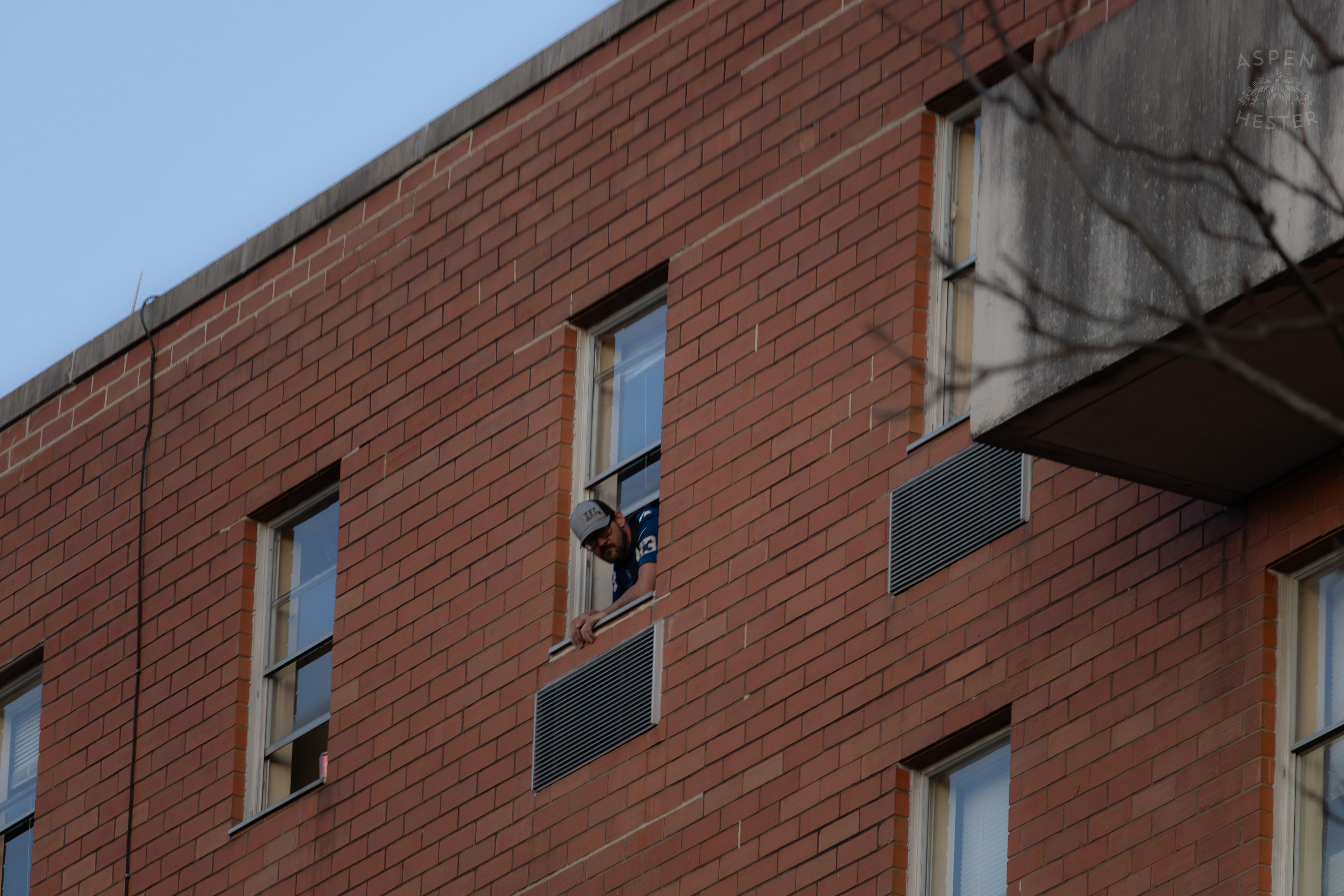 A Stuck Resident Watches From The Top Floor Waiting for Rescue From The Parkview Tower Fire in New Albany Indiana. March 22nd, 2025/Aspen Hester