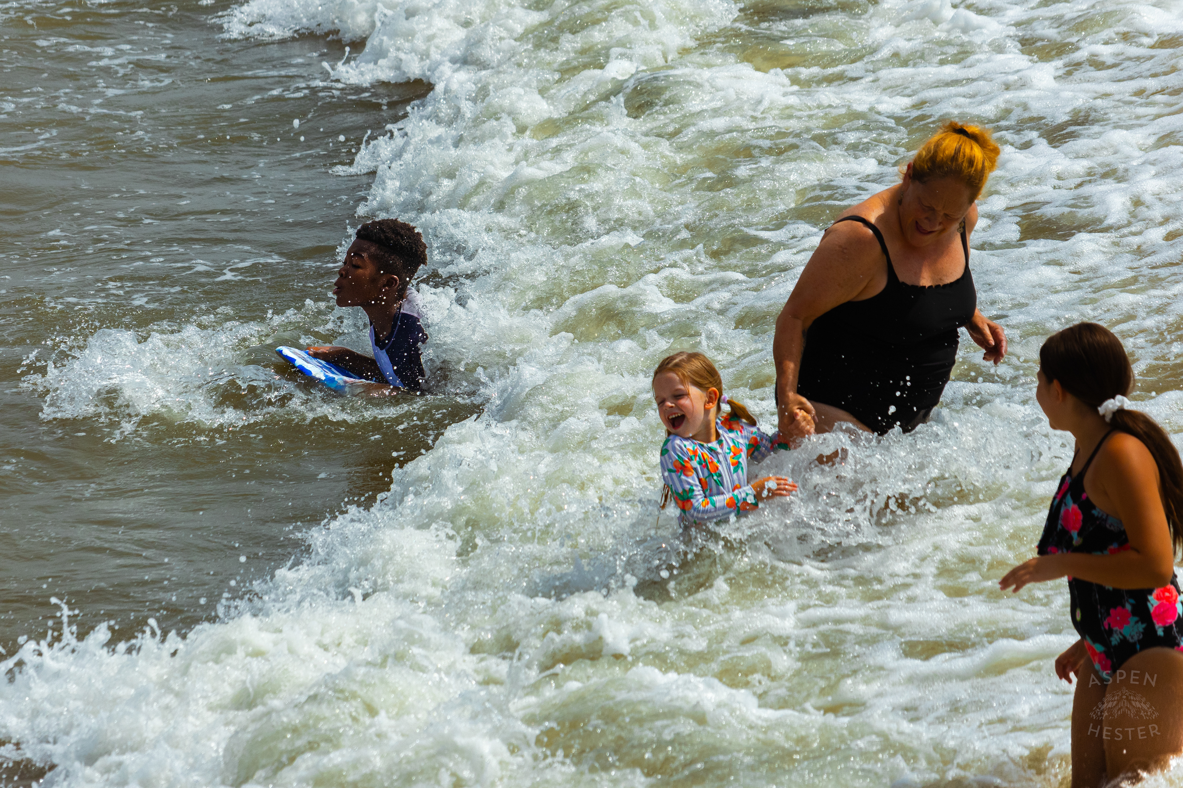 Kids Body Boarding and Splashing in The Waves on Tybee Island Georgia. June 27th, 2024/Aspen Hester