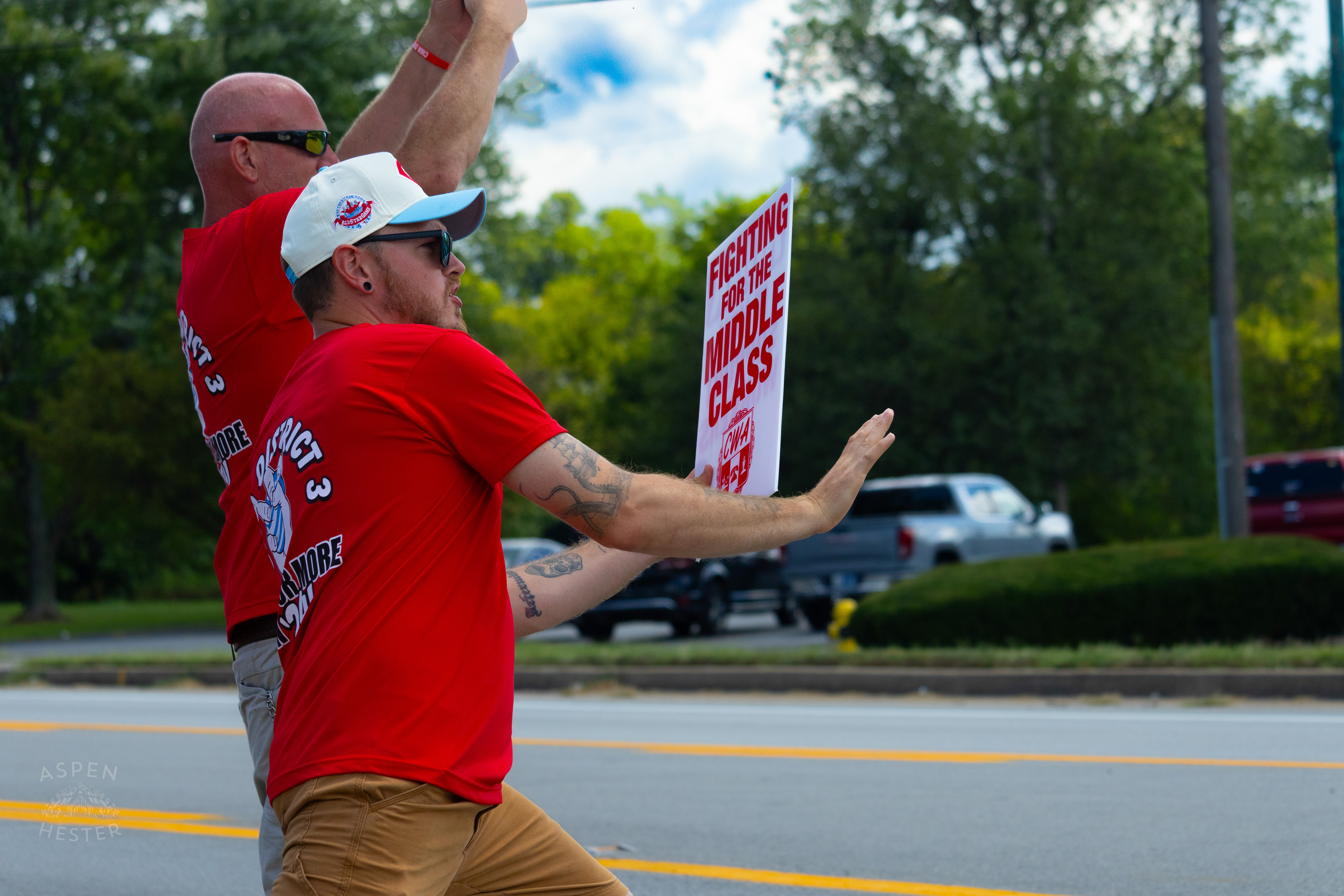 Member of The Communication Workers of America Union Encourages Cars to Honk in Support of Their  Strike Against AT&T for Fair Pay and Benefits. August 18th, 2024/Aspen Hester