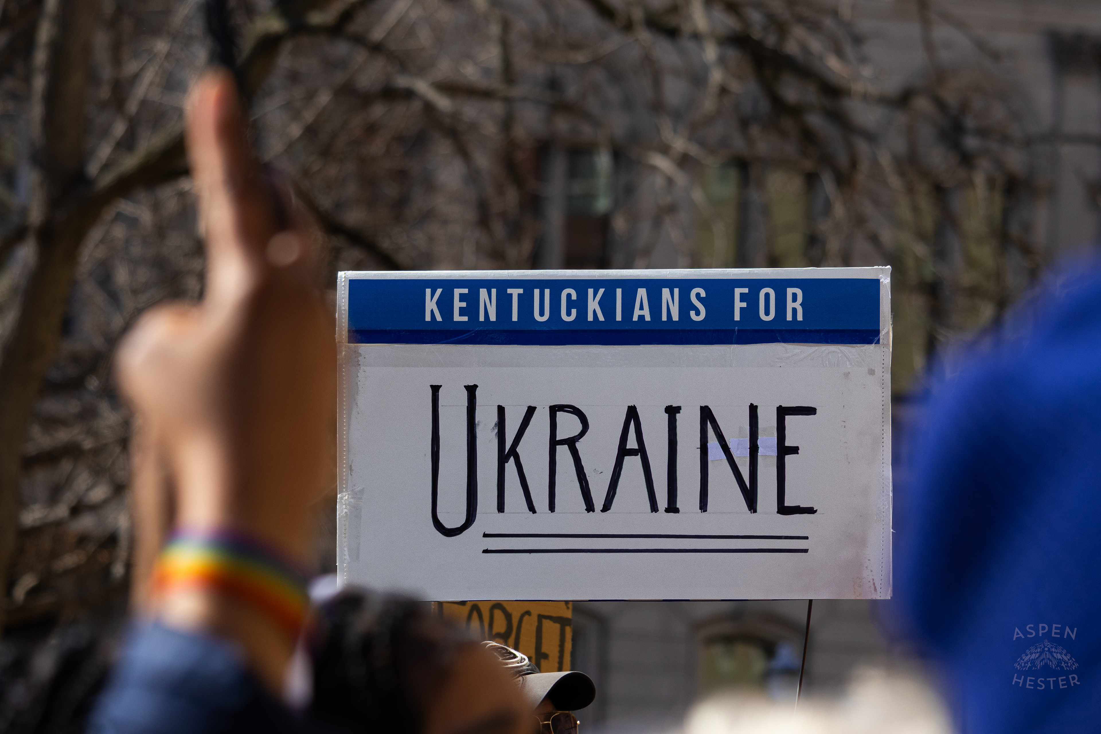 A Louisvillian Holds A Sign in Support of Ukraine as The Community Rallies in Support of Ukraine. March 2nd, 2025/Aspen Hester