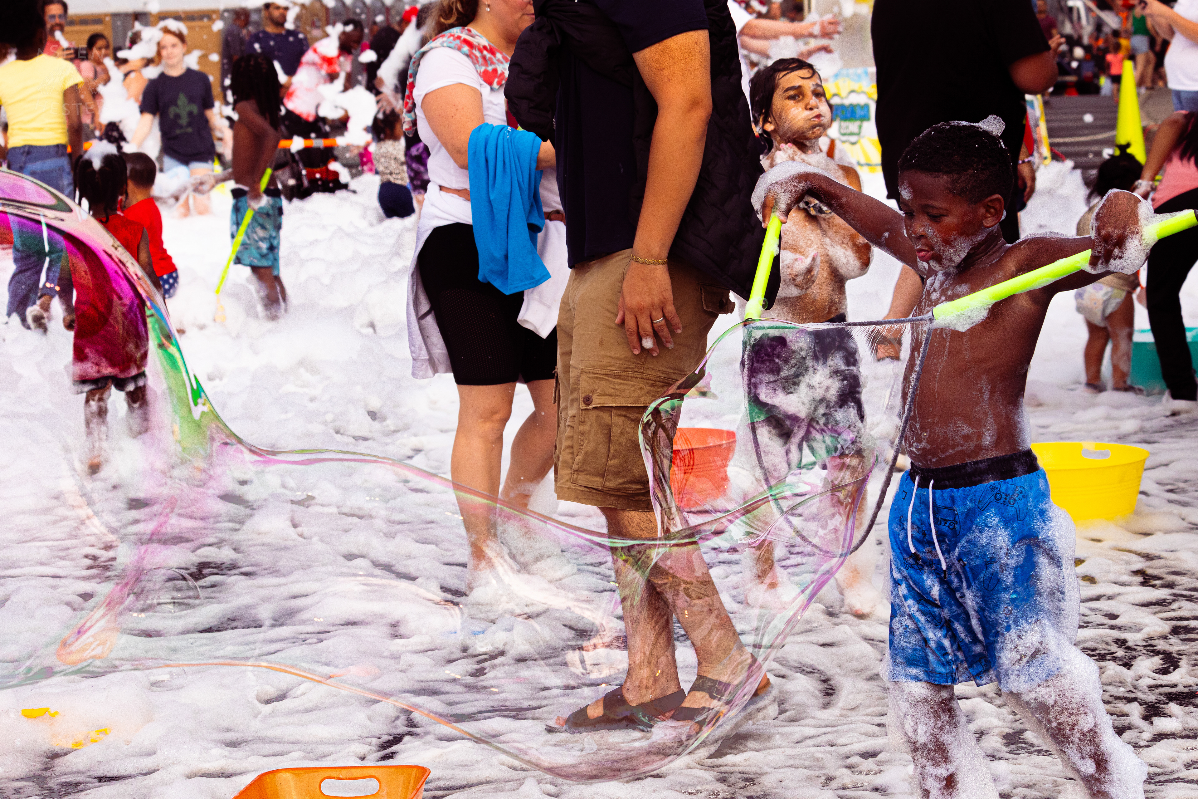 Kid Making Bubbles in the Bubble Party at Waterfront Park Fourth of July. July 4th, 2024/Aspen Hester