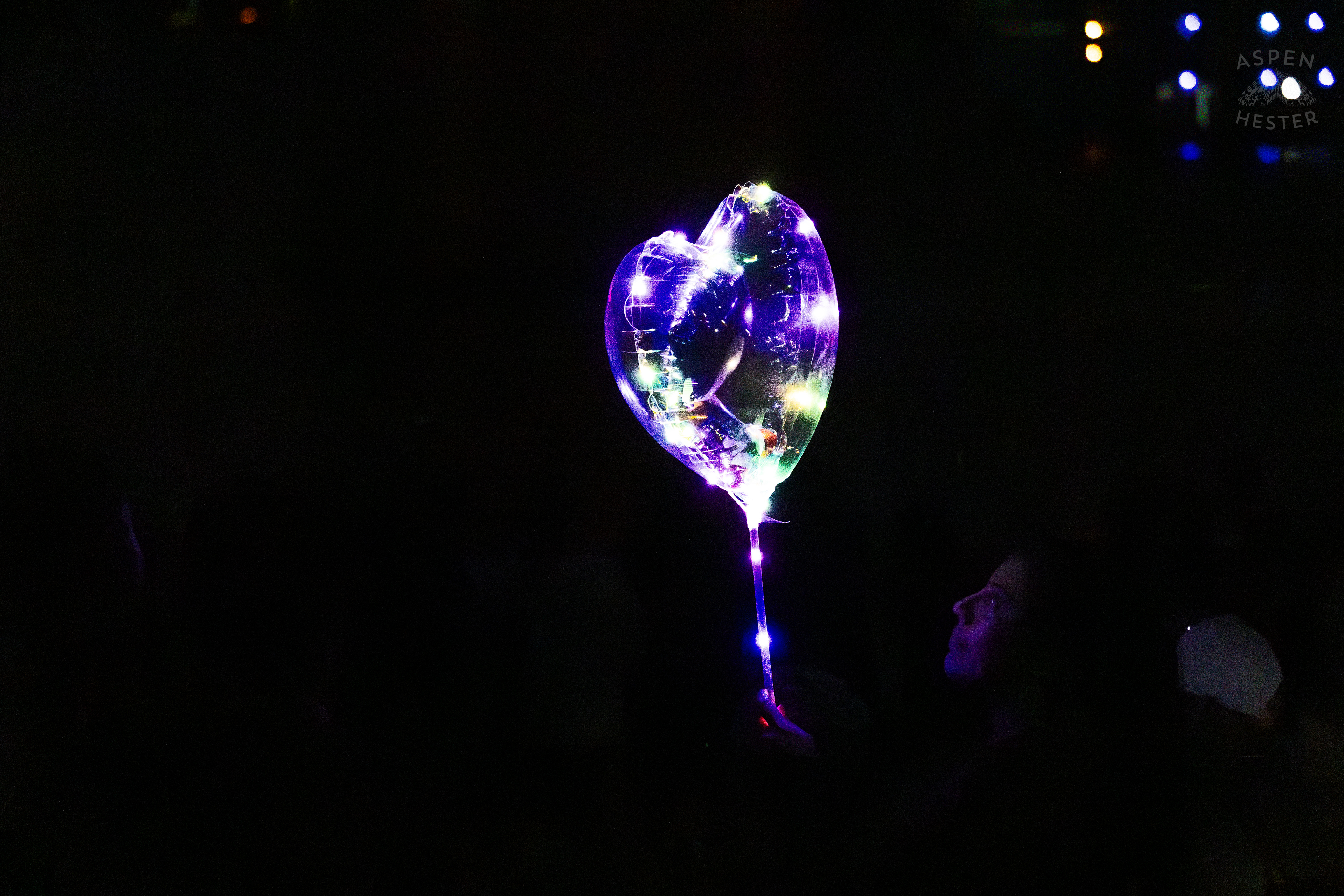Attendee Waits with A Glow Balloon for The Fireworks Show at Waterfront Park Fourth of July. July 4th, 2024/Aspen Hester