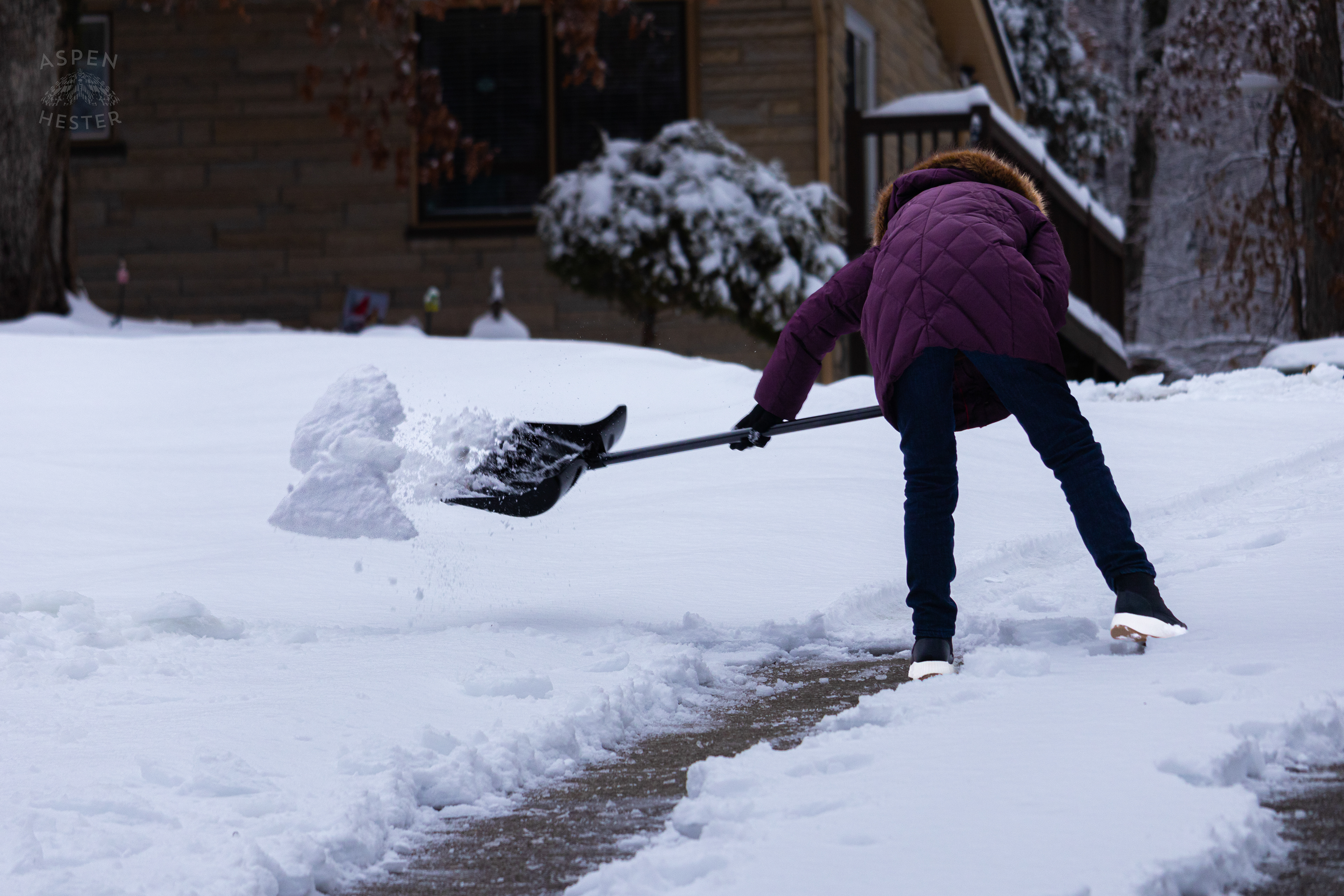 Susan Orloff Shoveling Her Long Waverly Hills Driveway After Winter Storm Blair Dropped Inches of Snow and Ice. January 6th, 2025/Aspen Hester