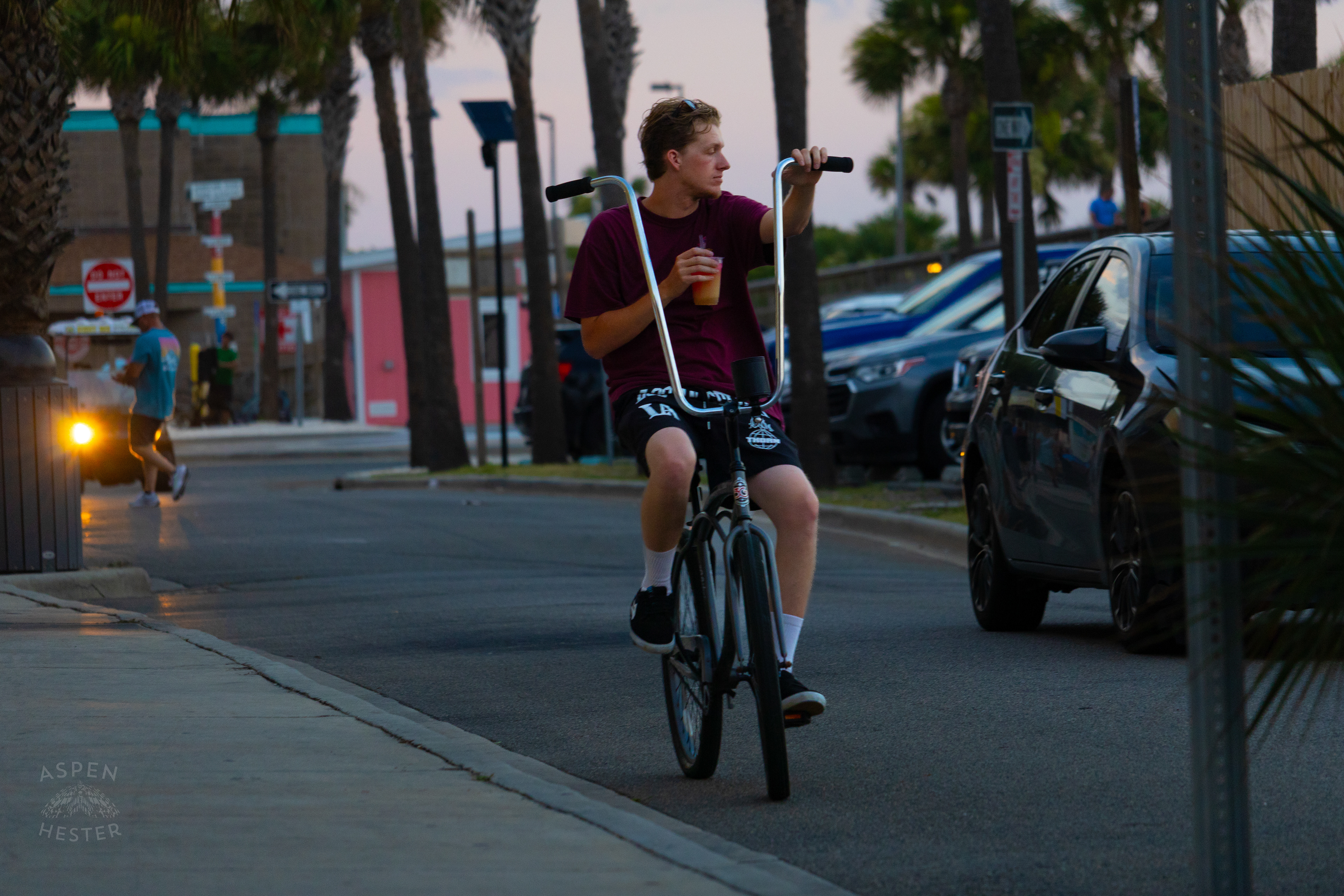 Biker Riding Down Main Street Tybee Island Georgia. June 23rd, 2024/Aspen Hester