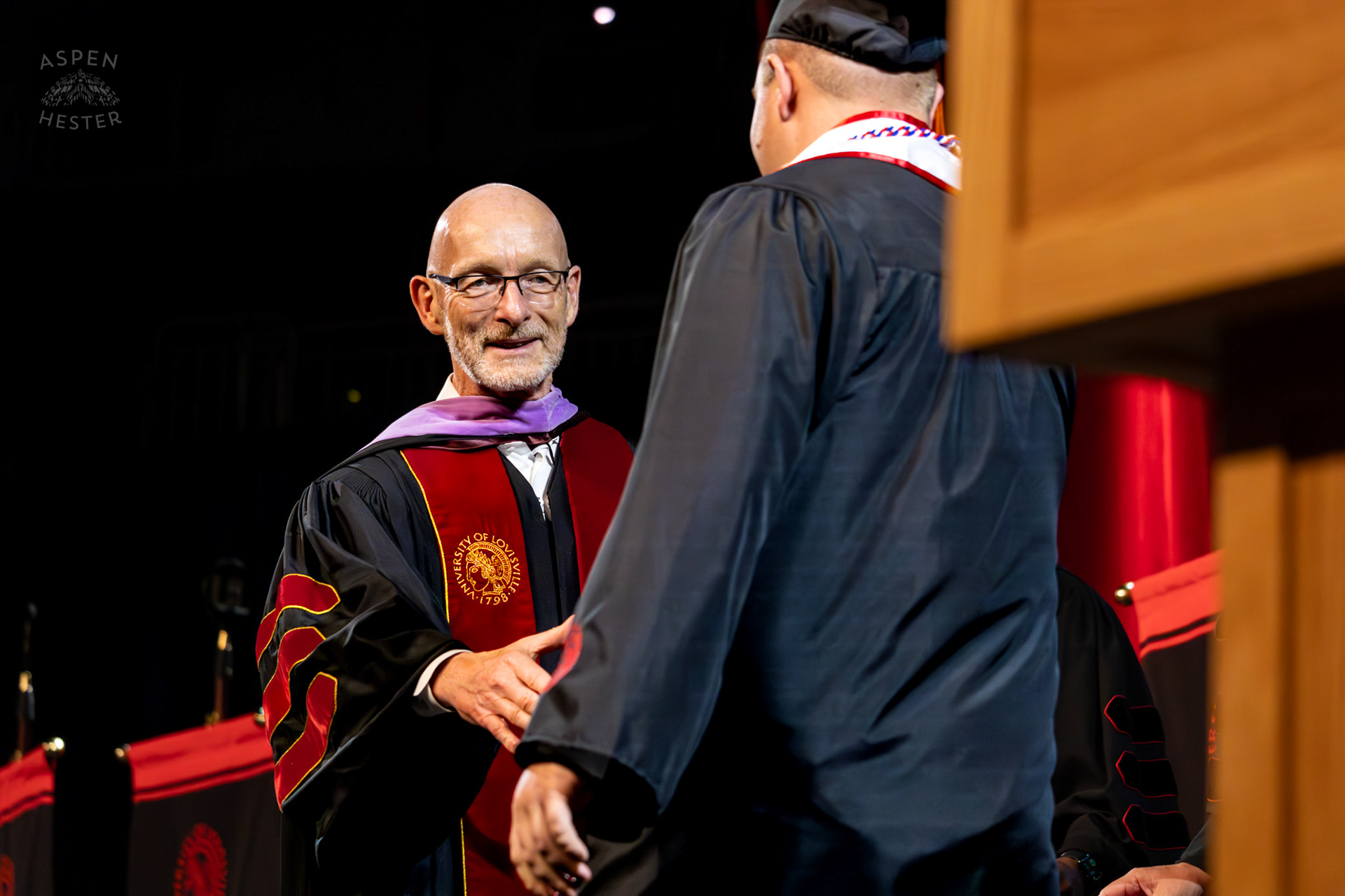 Student Receiving Their Diploma at UofL's 2024 Spring Graduation. May 11th, 2024/Aspen Hester