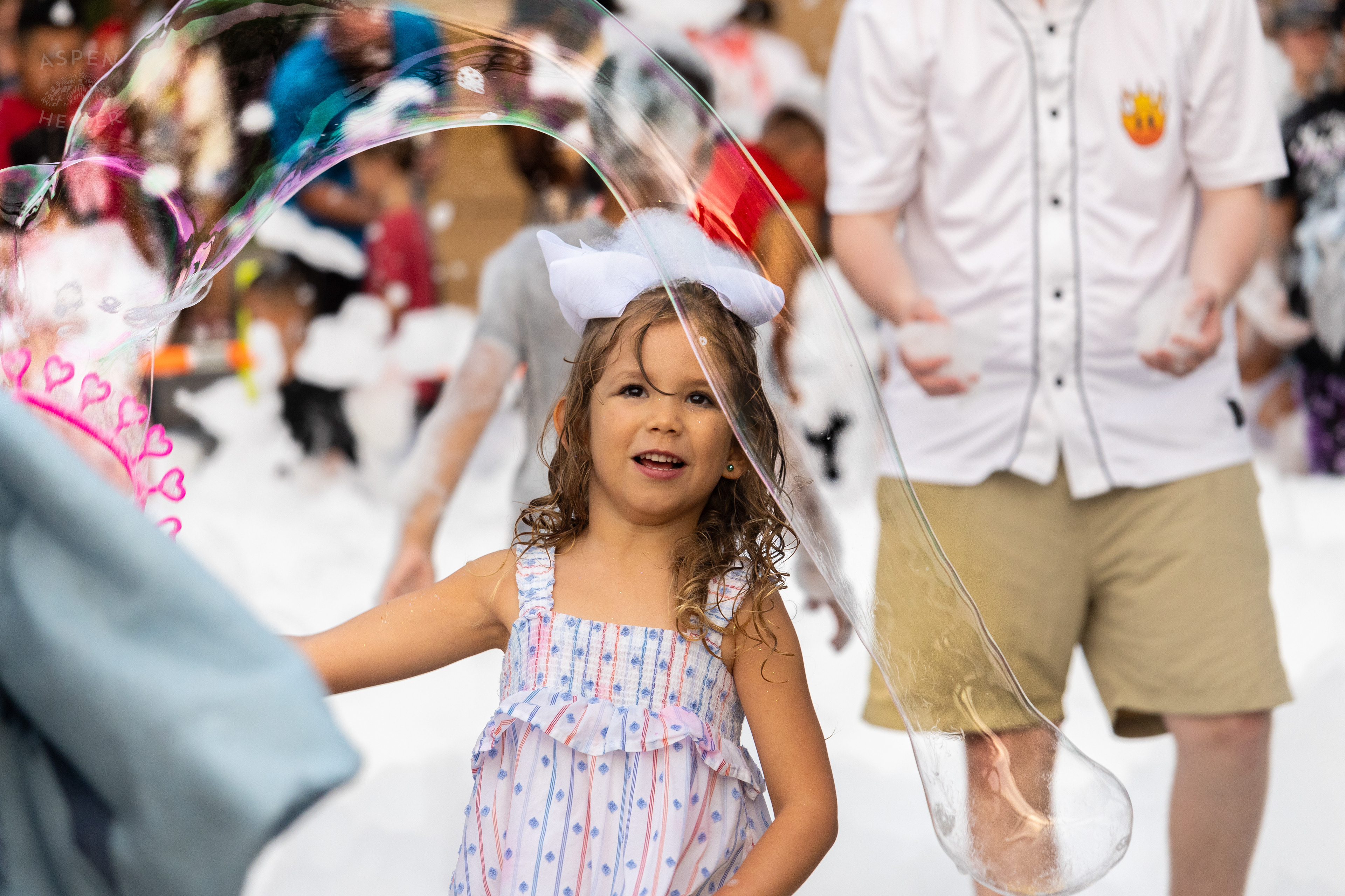 Christina Sanjuan's Daughter Playing in the Bubble Party at Waterfront Park Fourth of July. July 4th, 2024/Aspen Hester