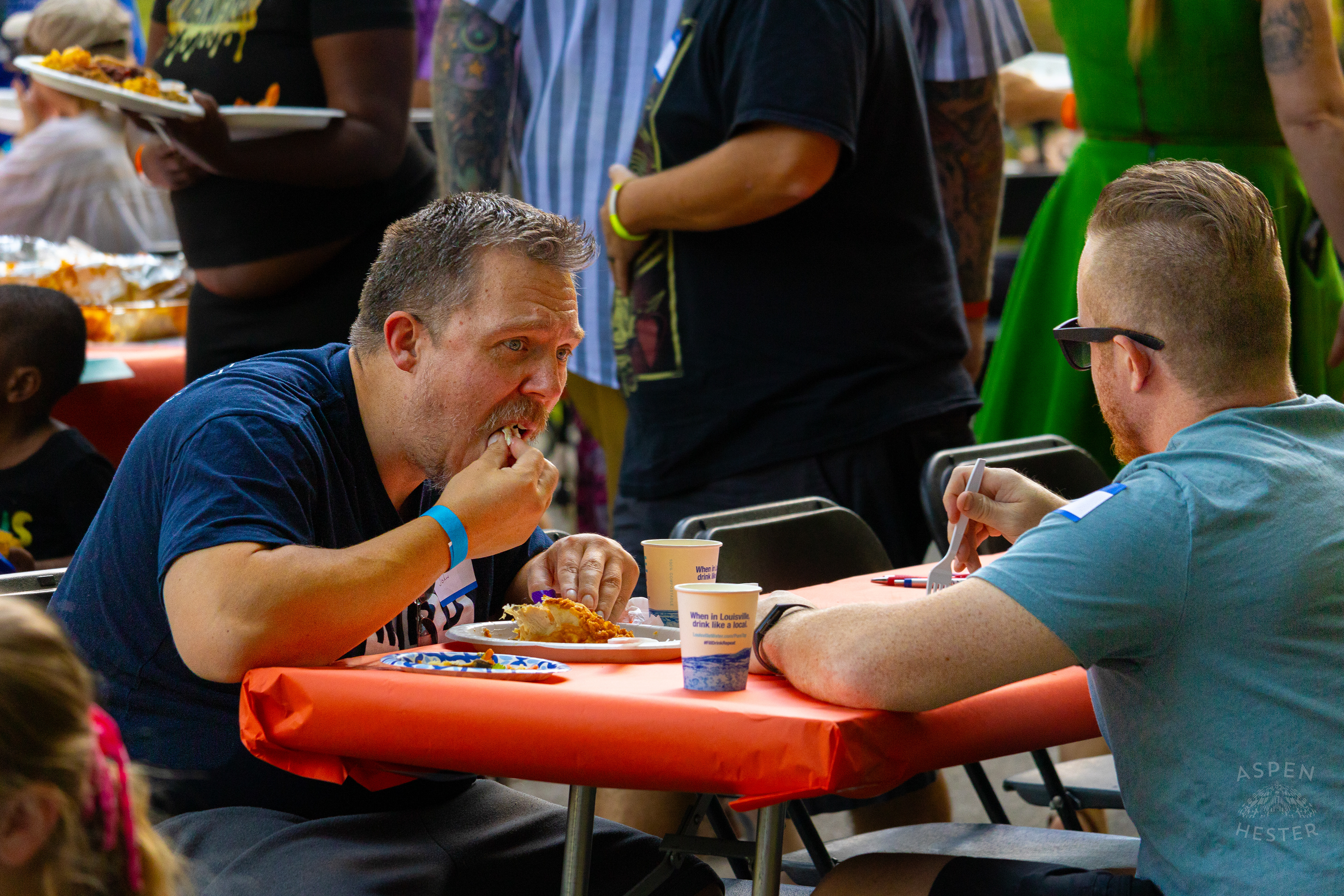 Community Members Eating from The Big Table at Iroquois Park. September 15th, 2024/Aspen Hester