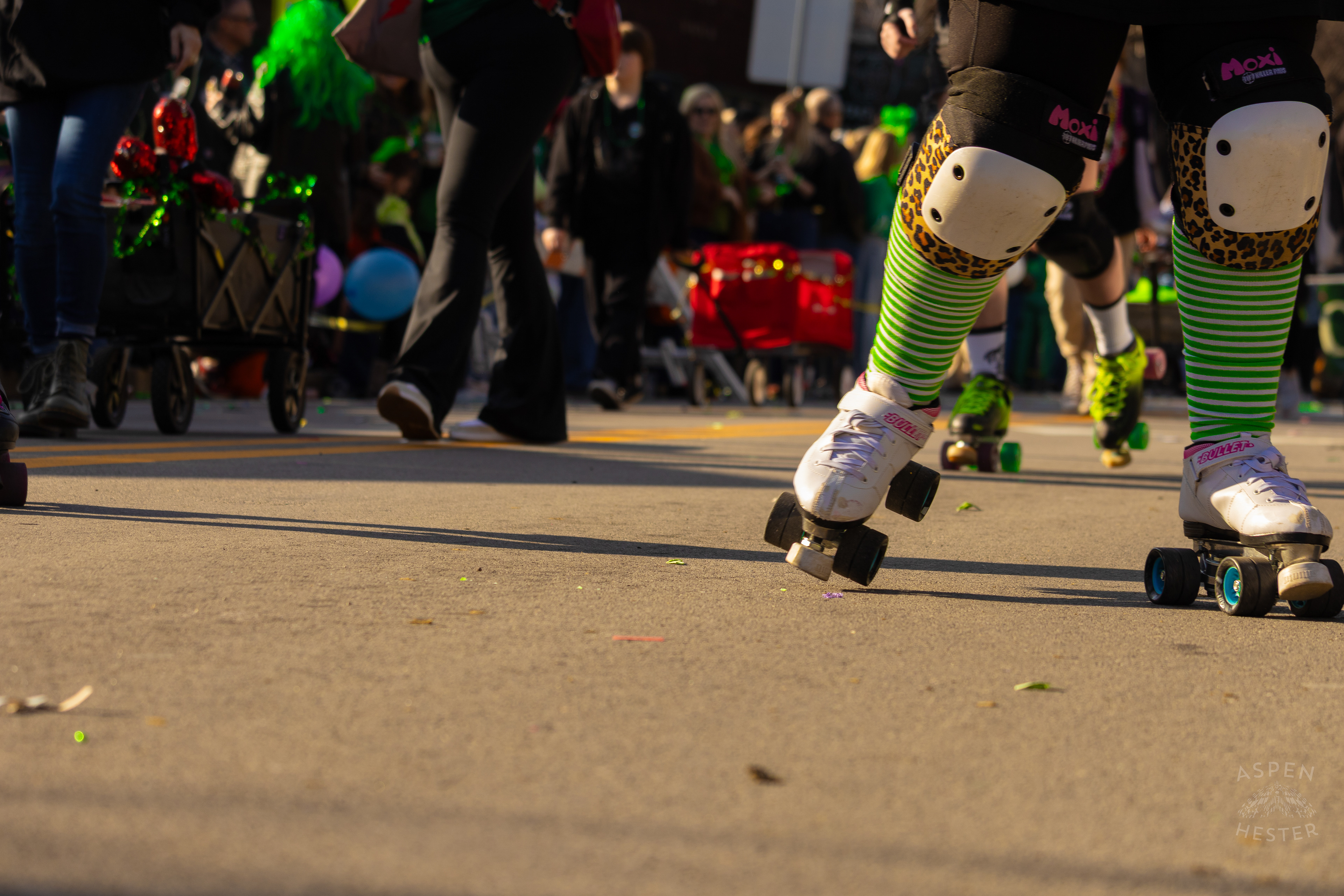 Members of Louisville Roller Derby Skate Through The Highlands in The 52nd Annual Saint Patrick’s Day Parade. March 8th, 2025/Aspen Hester