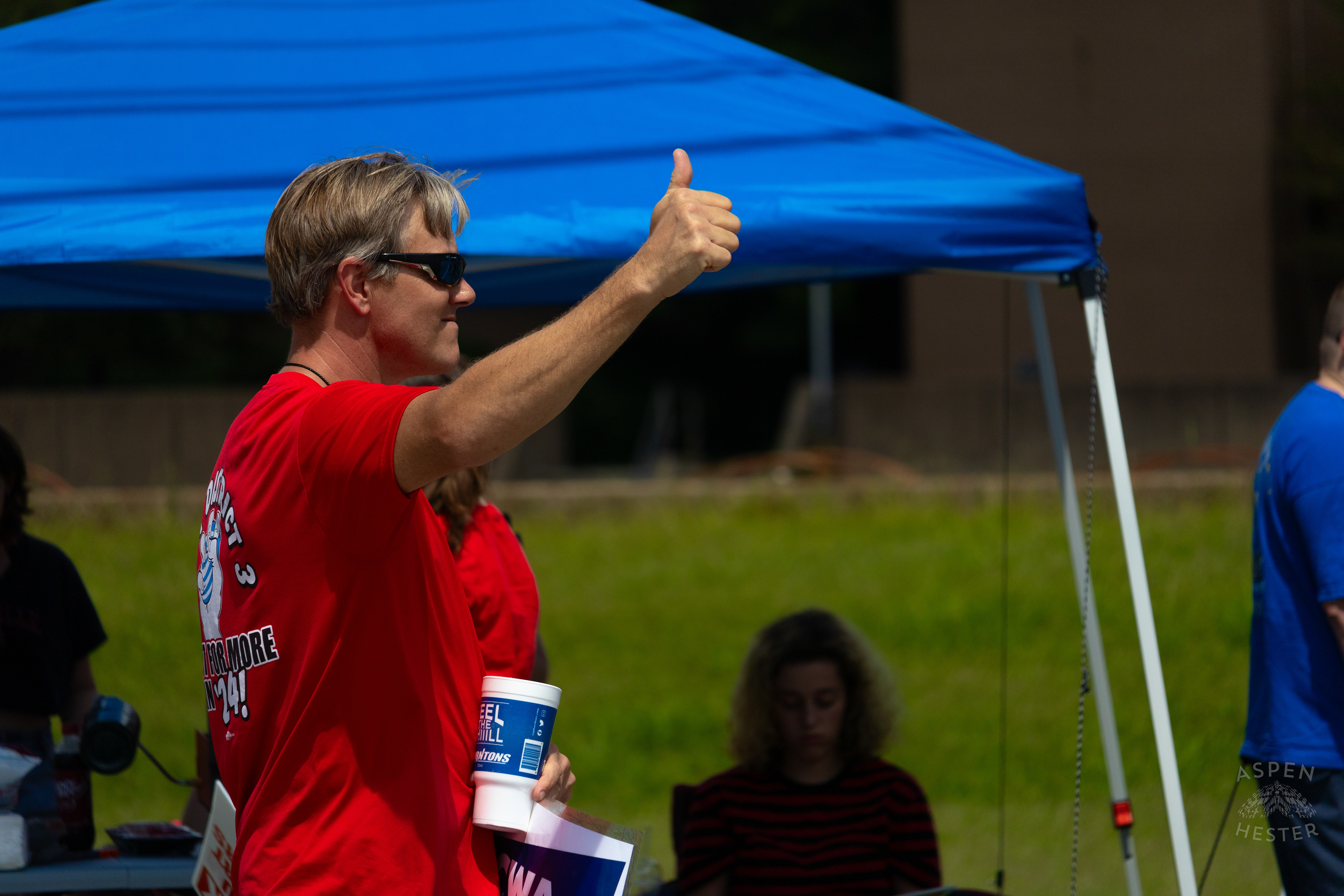 Member of The Communication Workers of America Union Encourages Cars to Honk in Support of Their  Strike Against AT&T for Fair Pay and Benefits. August 18th, 2024/Aspen Hester