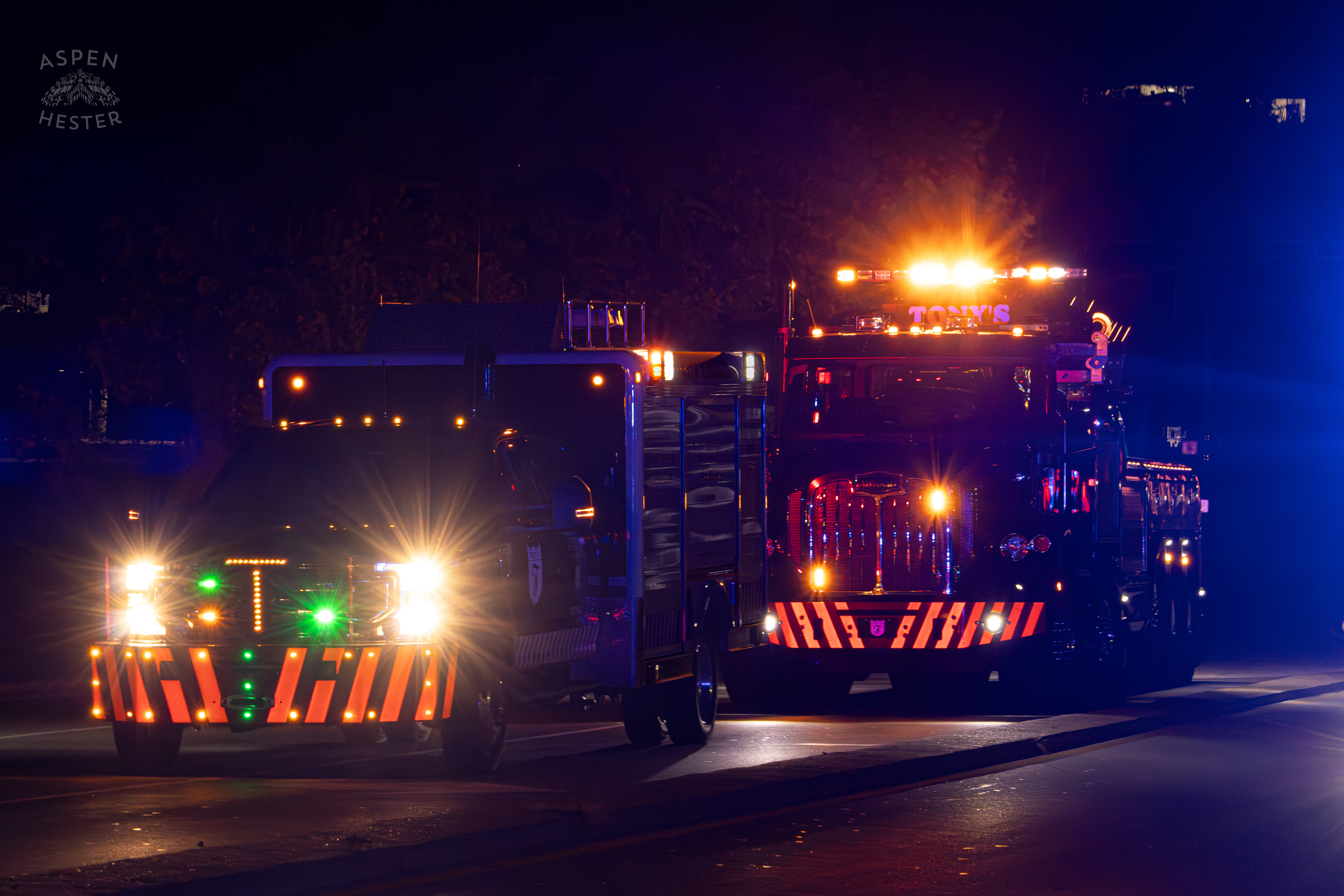 Tony’s Wreckers Waiting to Remove The Piper Cherokee Plane from the Road after it Crash Landed, Taking Out Utility Poles, and Hitting A Car on Breckenridge Lane and Kresge Way. October 11th, 2024/Aspen Hester 