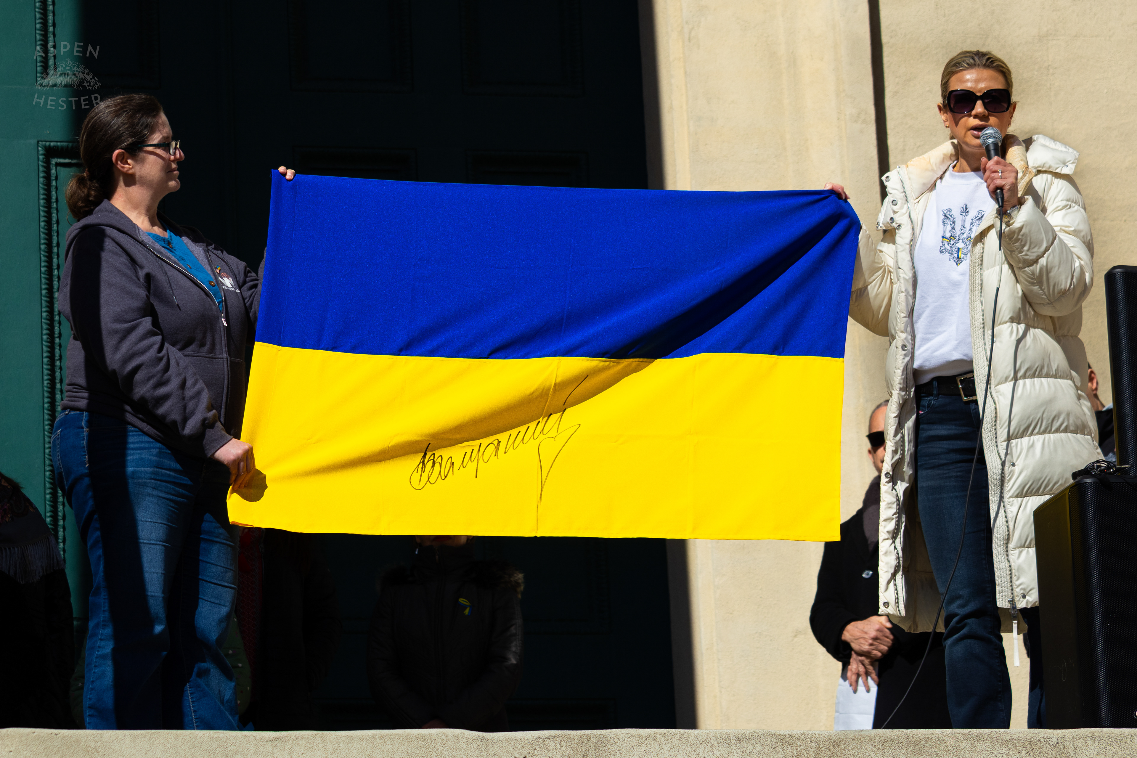Ukrainian Louisvillians Hold A Ukraine Flag Signed by an Army Hero as The Community Rallies in Support of Ukraine. March 2nd, 2025/Aspen Hester