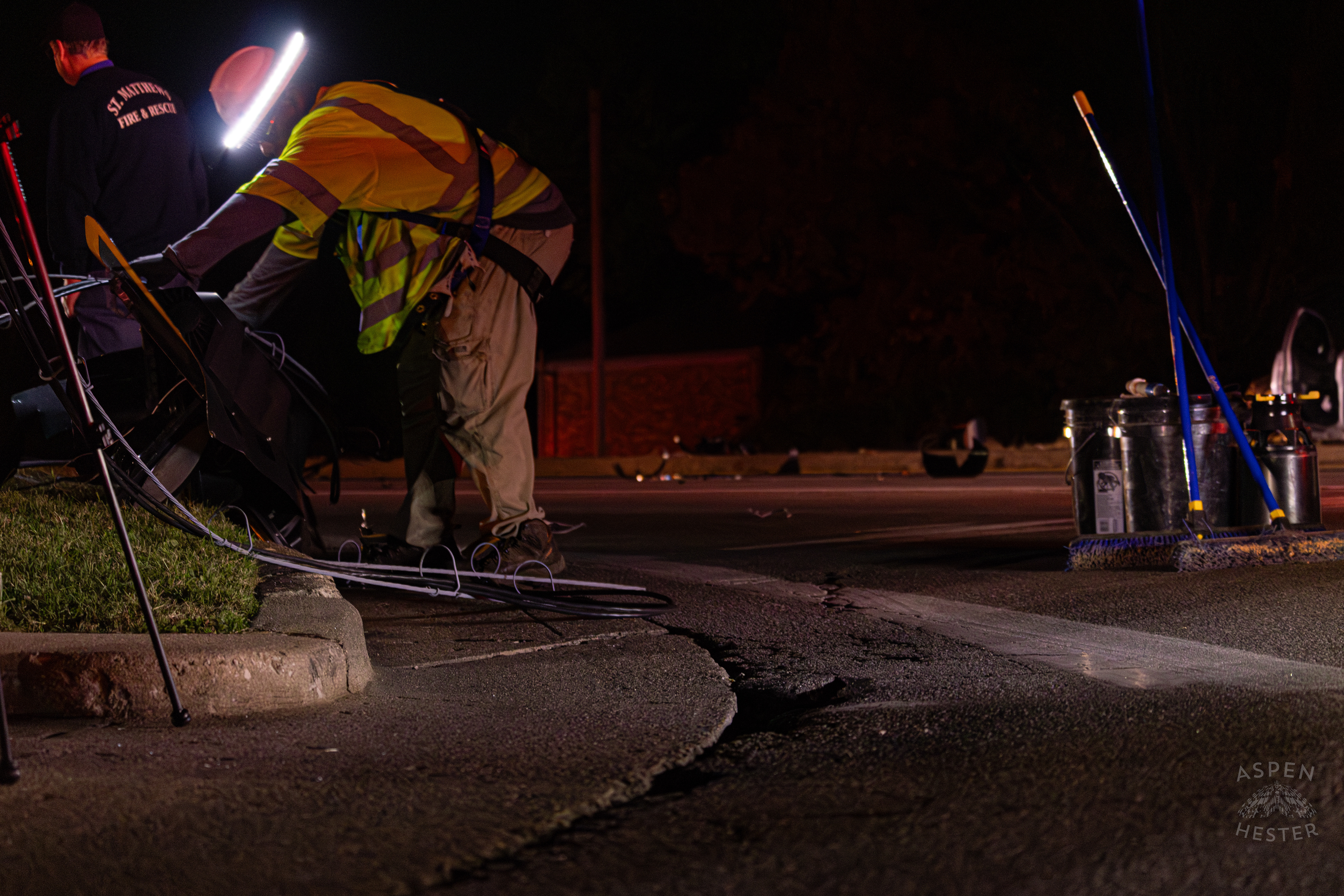 Crew from Tony’s Wreckers Clearing The Scene to Begin Removing The Piper Cherokee Plane from the Road after it Crash Landed, Taking Out Utility Poles, and Hitting A Car on Breckenridge Lane and Kresge Way. October 11th, 2024/Aspen Hester 