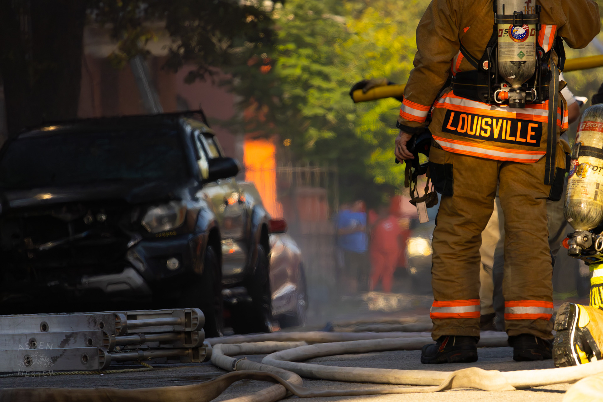 Louisville Firefighter Battling Flames on The Corner of 2nd and Oak Street. June 7th, 2024/Aspen Hester
