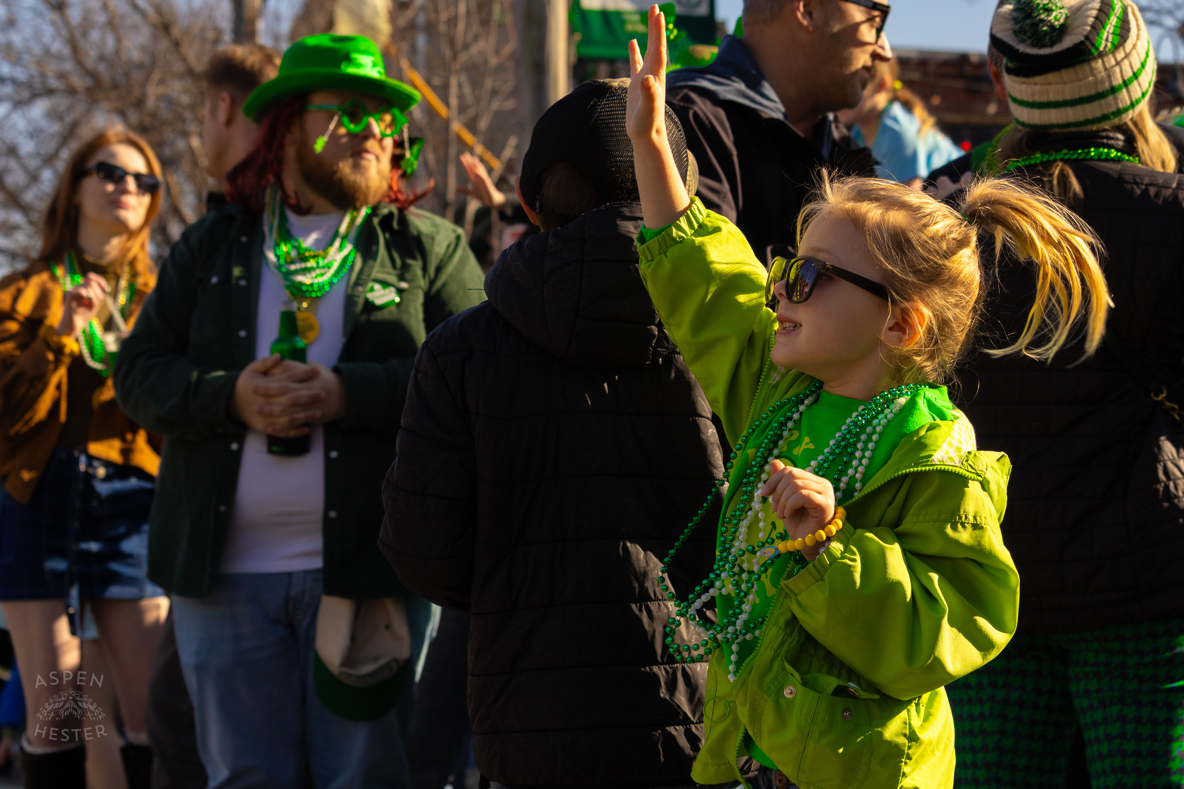 Kids Yell and Shout for Beads as The 52nd Annual Saint Patrick’s Day Parade Rolls Through The Highlands. March 8th, 2025/Aspen Hester