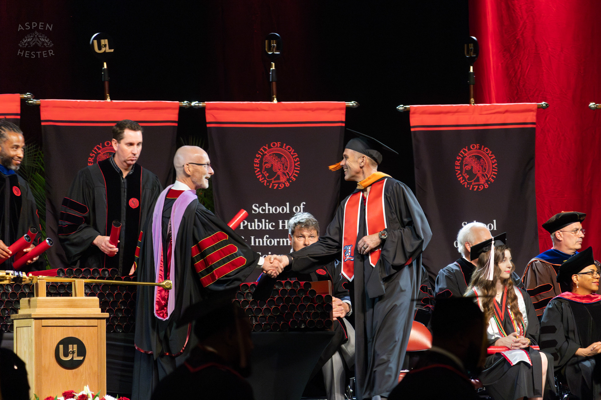 Student Receiving Their Diploma at UofL's 2024 Spring Graduation. May 11th, 2024/Aspen Hester
