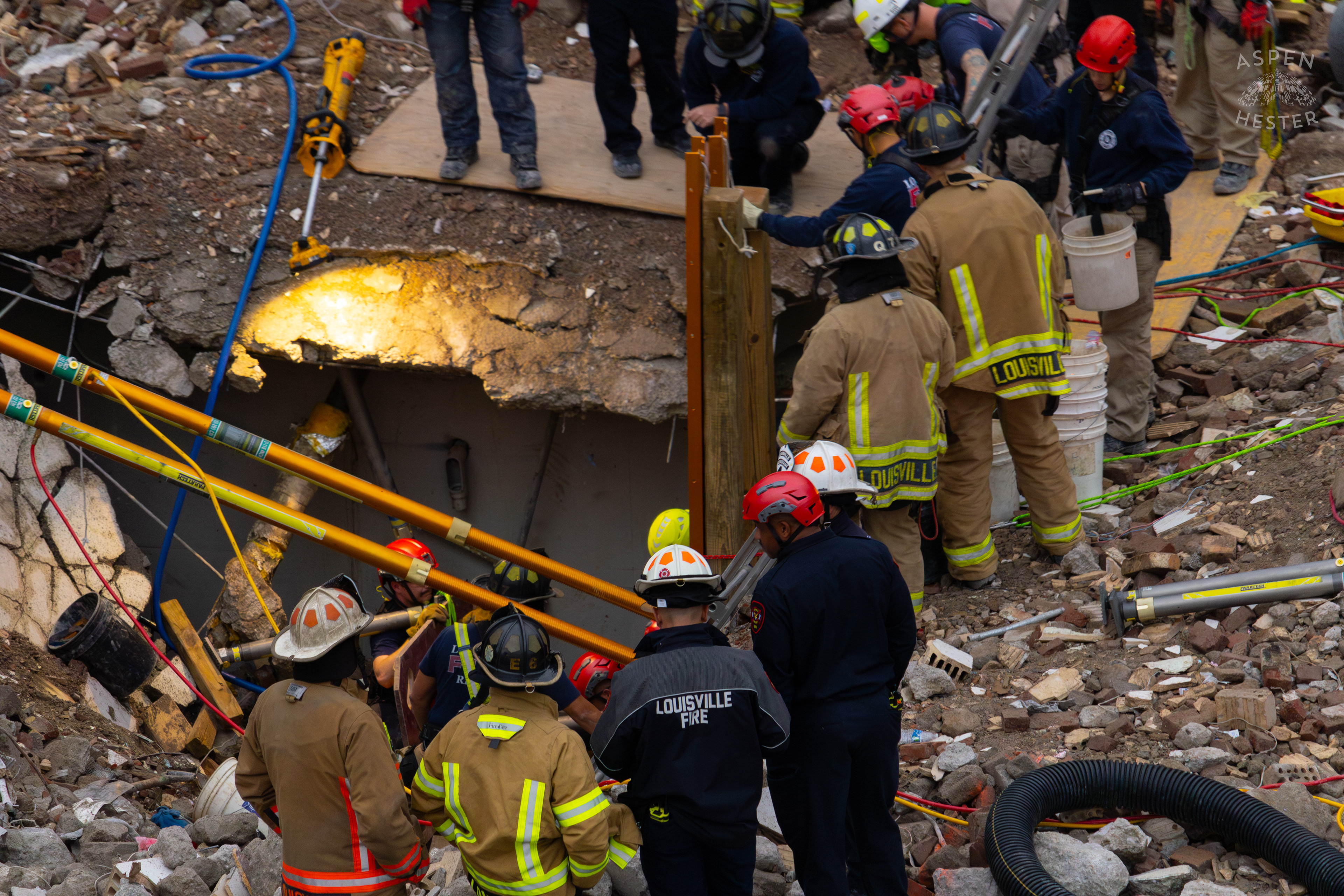 Crew Members Communicate with and Watch Their Crewmates Working Deep Underground During the 8+ Hour LFD Effort to Free A Trapped Demo Worker. November 11th, 2024/Aspen Hester