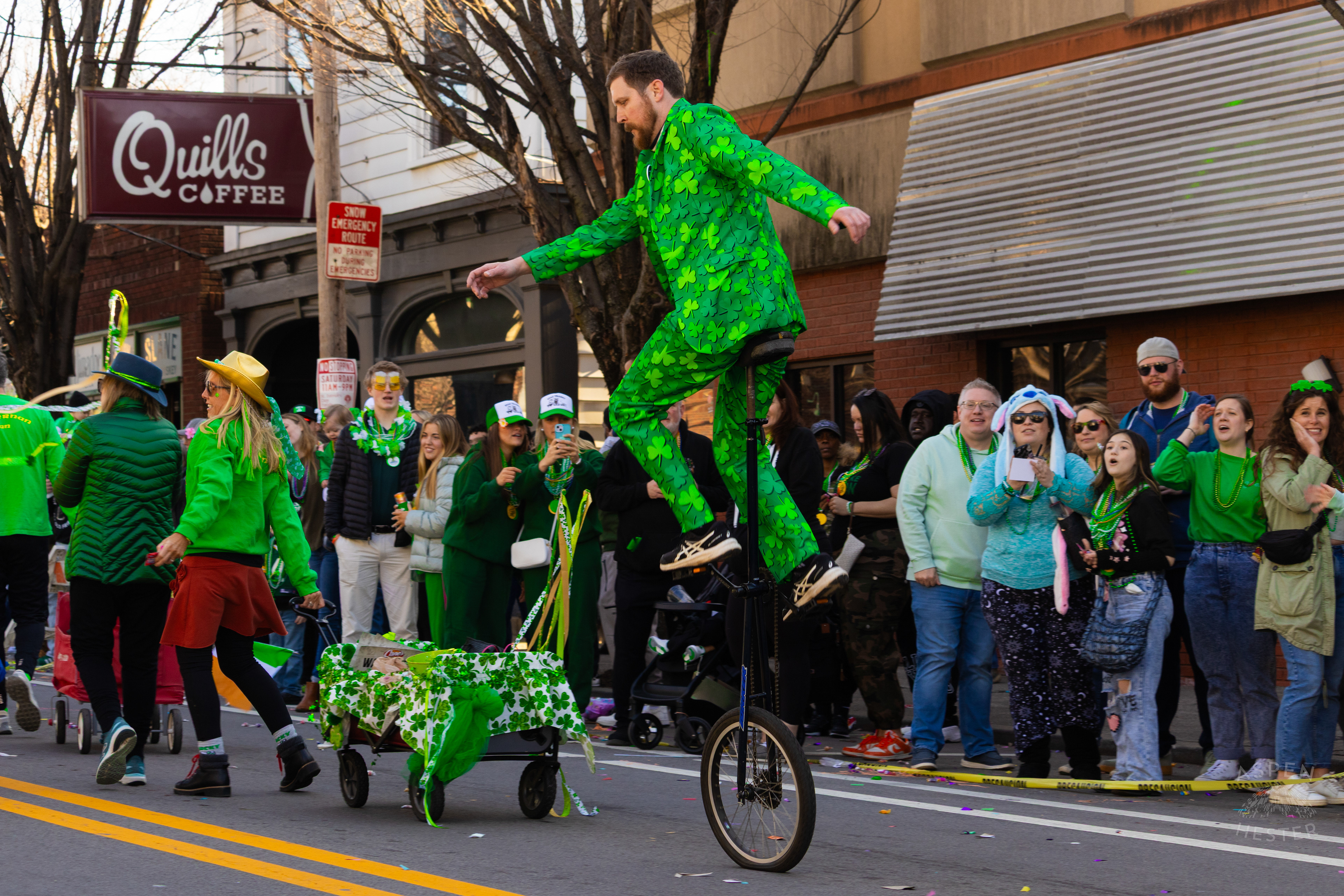 Unicyclist with The McKiernan Clan Entertains The Crowd as They Roll Through The Highlands in The 52nd Annual Saint Patrick’s Day Parade. March 8th, 2025/Aspen Hester