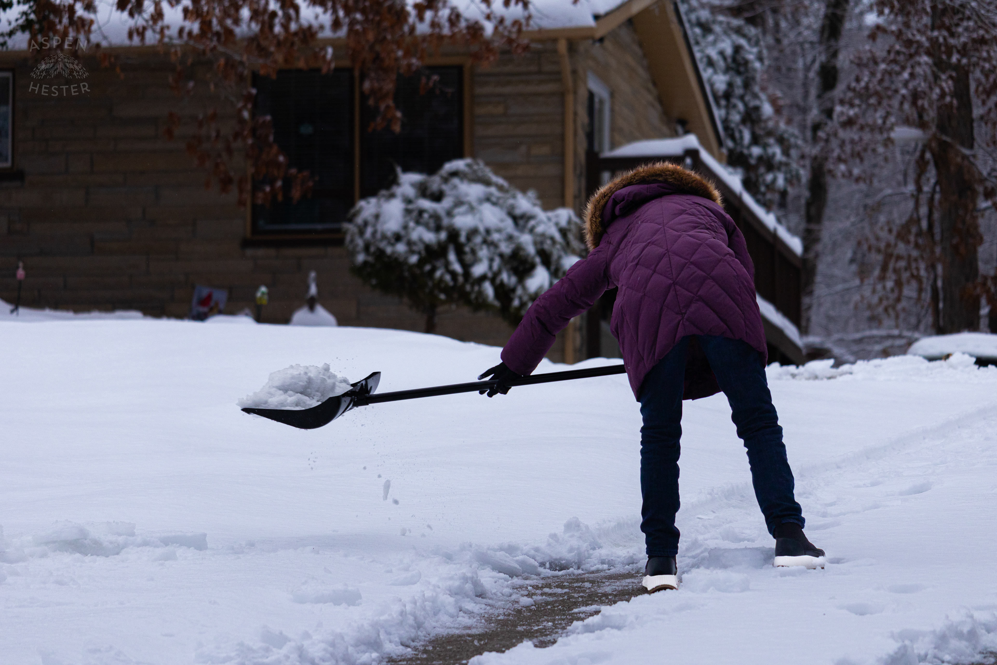 Susan Orloff Shoveling Her Long Waverly Hills Driveway After Winter Storm Blair Dropped Inches of Snow and Ice. January 6th, 2025/Aspen Hester